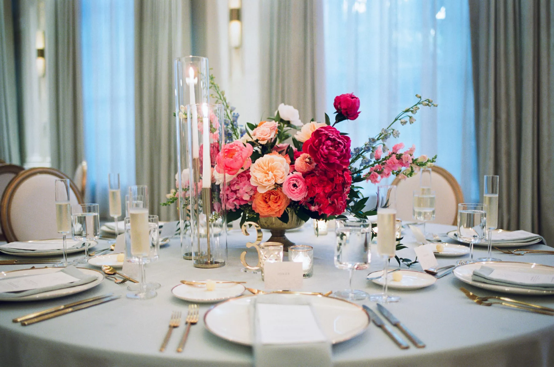 Luxurious Pink and Blue Wedding Reception Centerpiece Tablescape Decor Ideas | Pink Anemones and Hydrangeas, Orange Garden Roses, Blue Stock Flowers | Tampa Bay Florist Bruce Wayne Florals