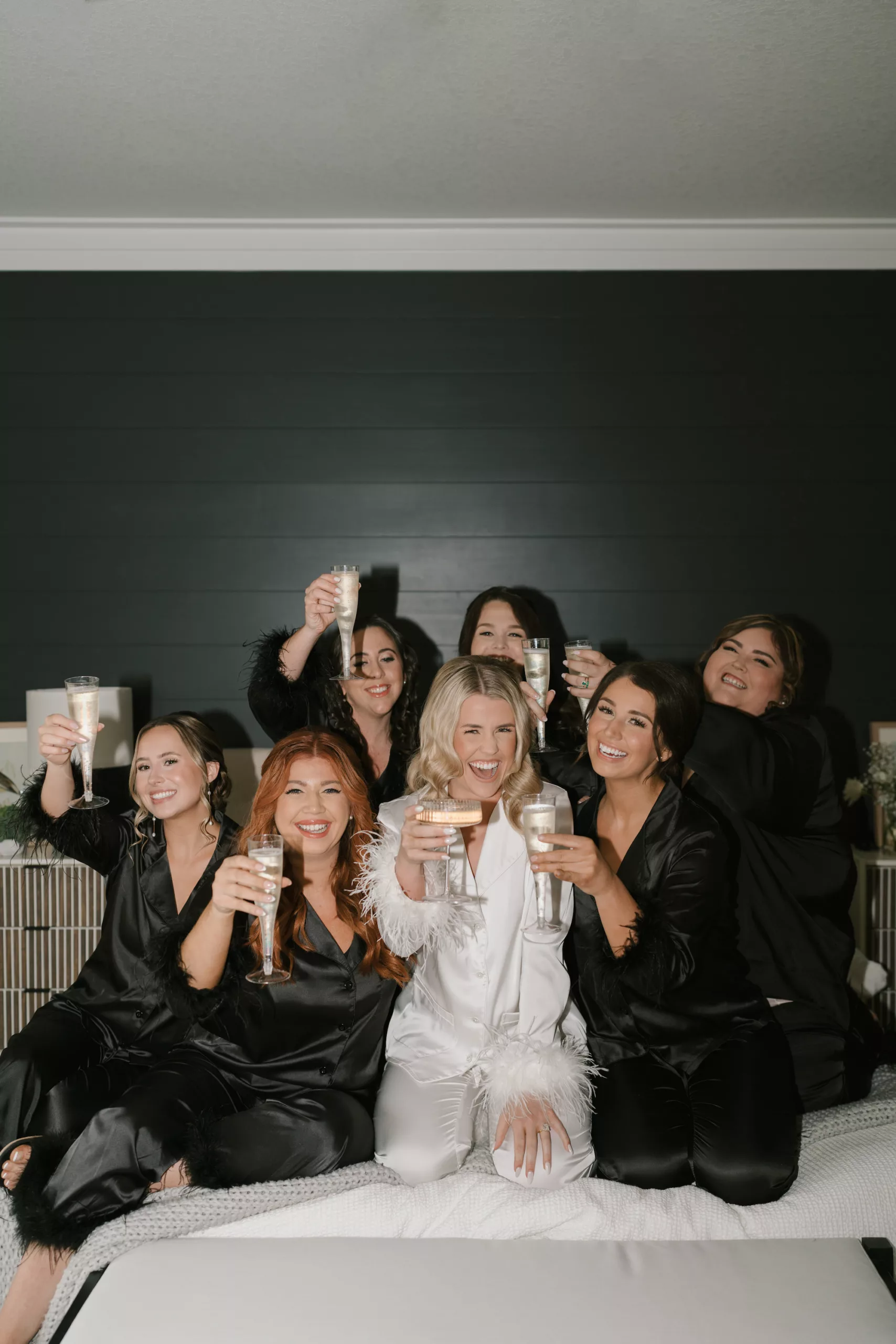 Bride and Bridesmaids Getting Ready Wedding Day Champagne Celebration