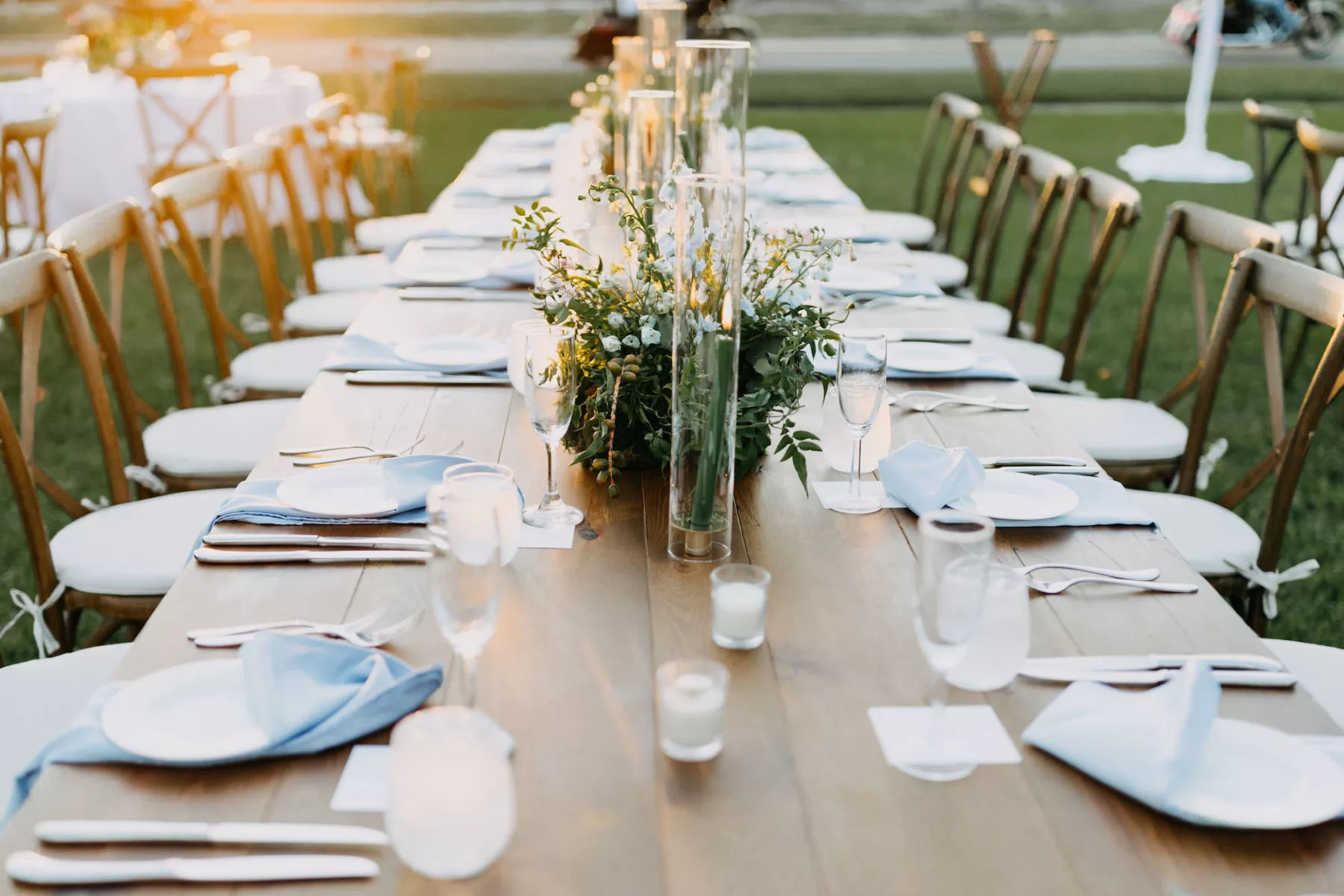 Old Florida Light Blue Fall Wedding Reception Feasting Table Inspiration | Green Taper Candles with Hurricane Glass Tube Centerpiece Ideas | Tampa Bay Event Planner Coastal Coordinating
