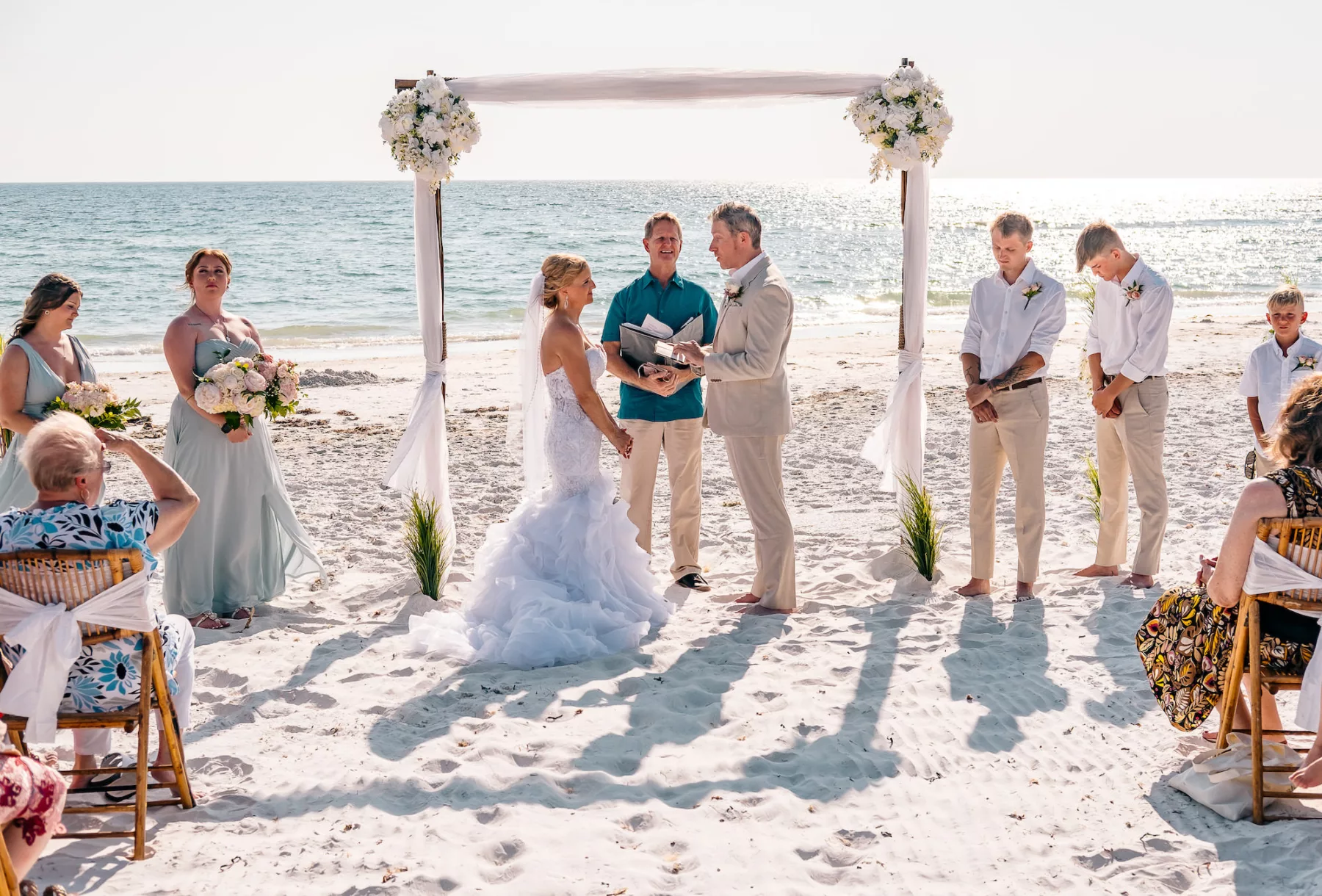 Bride and Groom Vow Exchange Beach Wedding Portrait | Tampa Bay Event Planner Gulf Beach Weddings