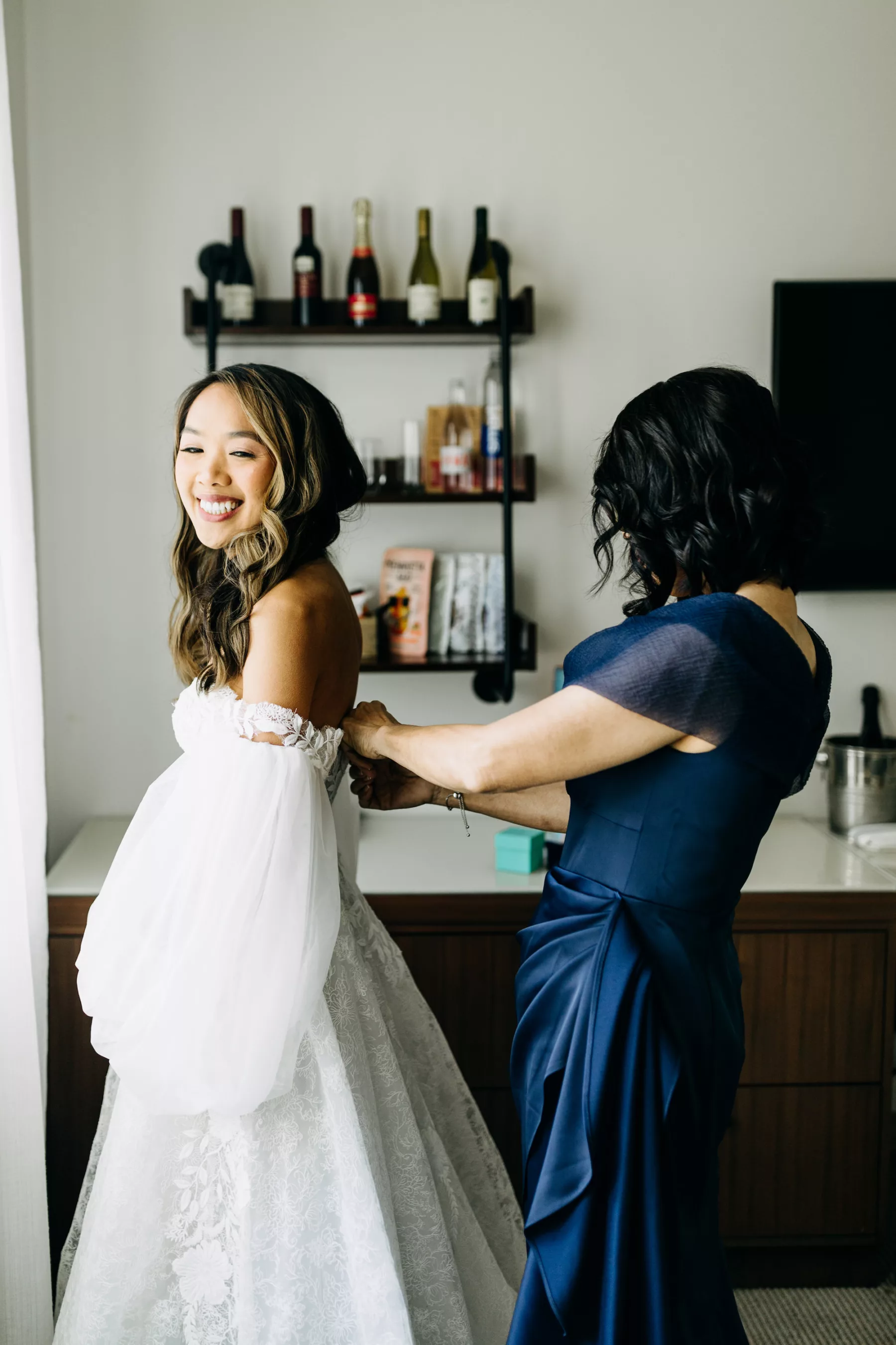 Bride Getting Ready Wedding Portrait | White Lace Off The Shoulder A Line Wedding Dress with Removable Puff Sleeves Ideas | Elegant Bridal Curls, Natural Inspired Makeup | Tampa Bay Hair and Makeup Artist Femme Akoi Beauty Studio | Photographer Amber McWhorter Photography