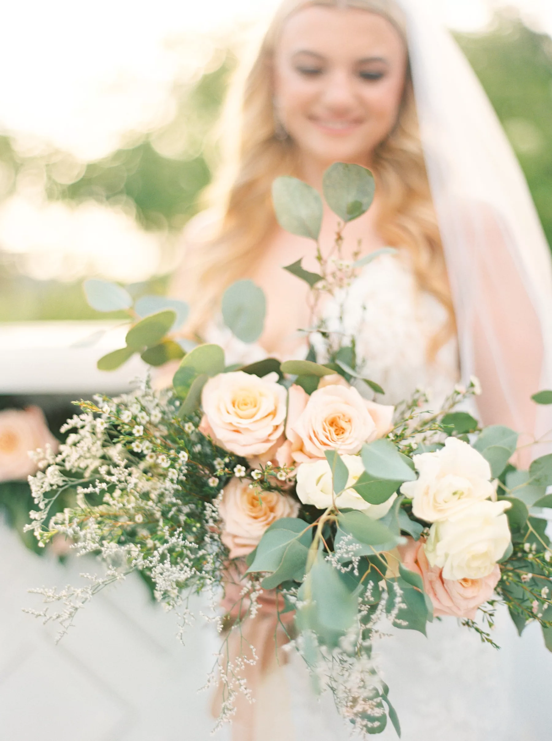 Blush Pink Roses, White Wax Flowers, and Greenery Bridal Wedding Bouquet Inspiration