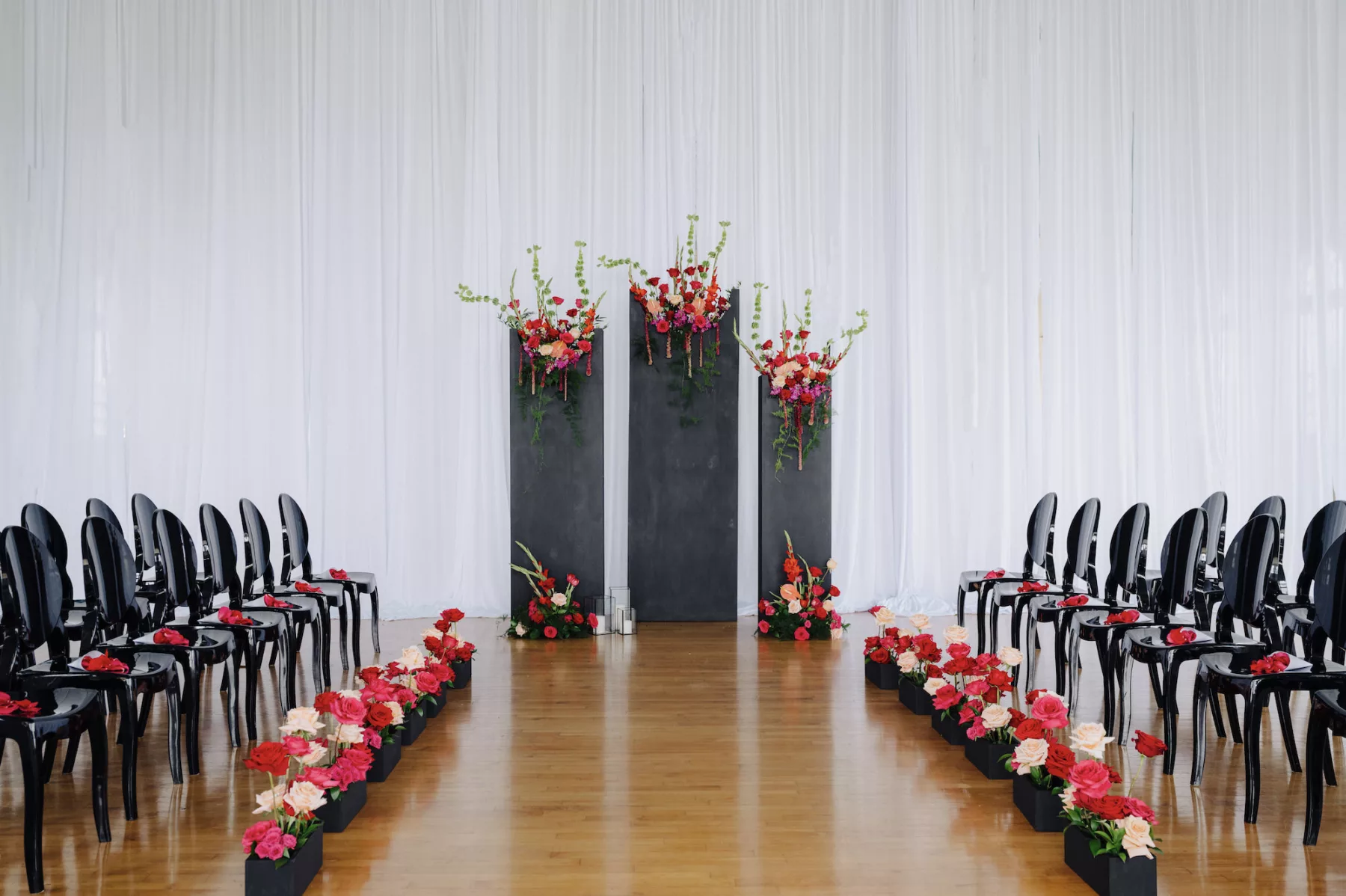 Modern Black and Pink Italian Inspired Wedding Ceremony Ideas | Unique Seating with Black Ghost Chairs Inspiration | Pink and Red Rose Aisle Decor Flower Arrangements | Tampa Bay Florist Save The Date Florida | Ybor Planner Eventfull Weddings | Rentals A Chair Affair
