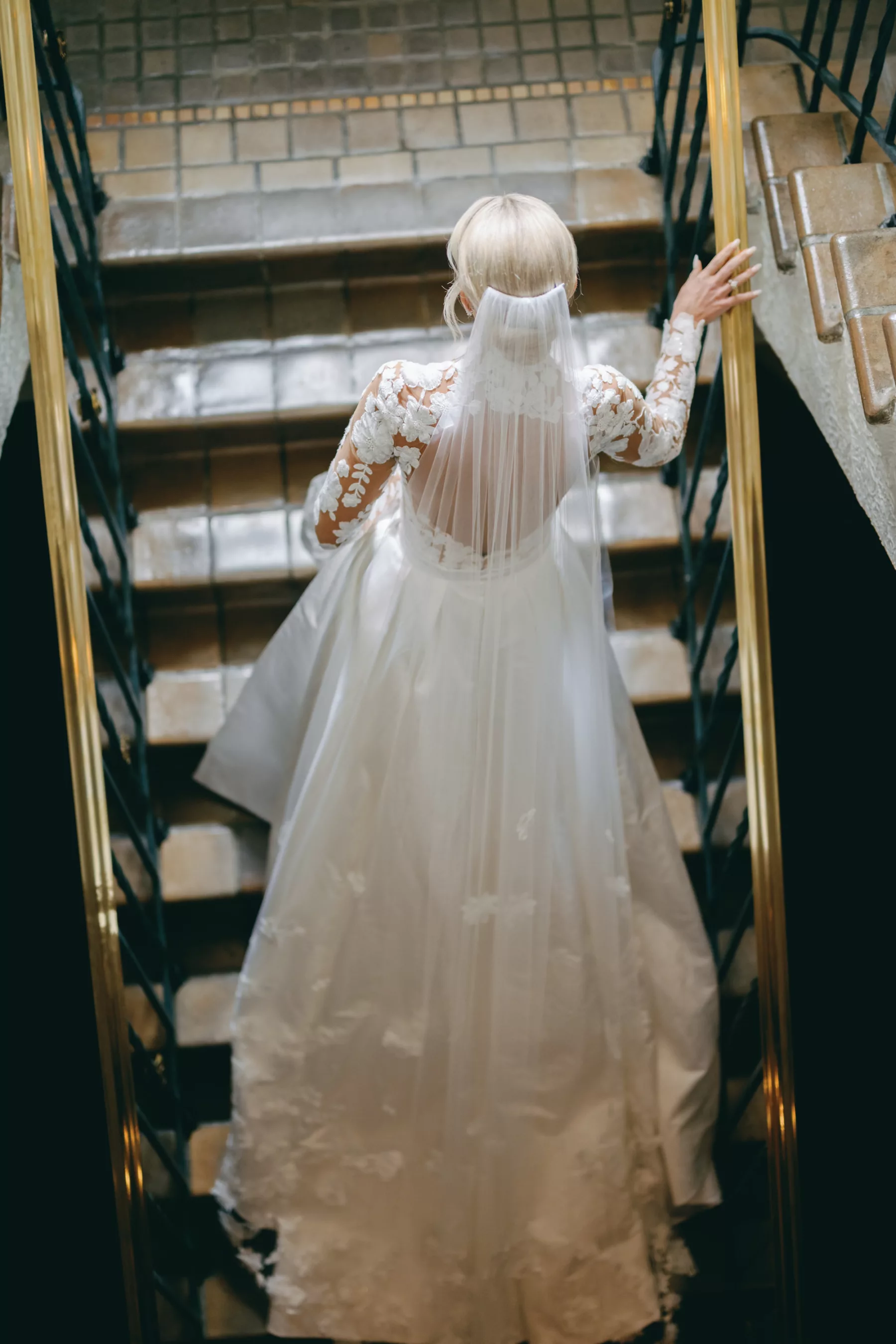Bride Ascending Stairs Wedding Portrait | Cathedral Length Veil Ideas