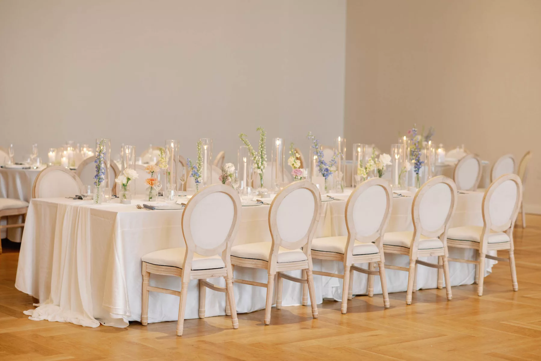 Whimsical Spring Wedding Reception Centerpiece Tablescape Decor Ideas | Blue Lily of the Valley, White Carnations, Pink Chrysanthemums, and Purple Roses in Bud Vases | Tampa Planner The Olive Tree Weddings | Historic Venue Hotel Haya