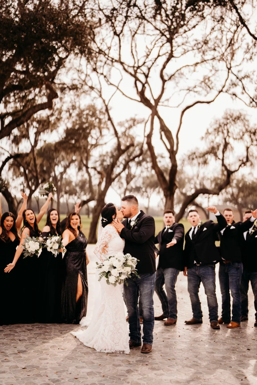 Southern Groomsmen Wedding Attire Inspiration | Black Jackets, Jeans, and Cowboy Boots | Mismatched Bridesmaid Dress Ideas | Tampa Bay Event Venue Simpson Lakes