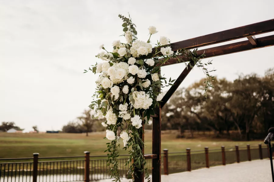 Rustic Wooden Wedding Ceremony Arch with White Roses, Hydrangeas, and Greenery Flower Arrangement Decor Ideas