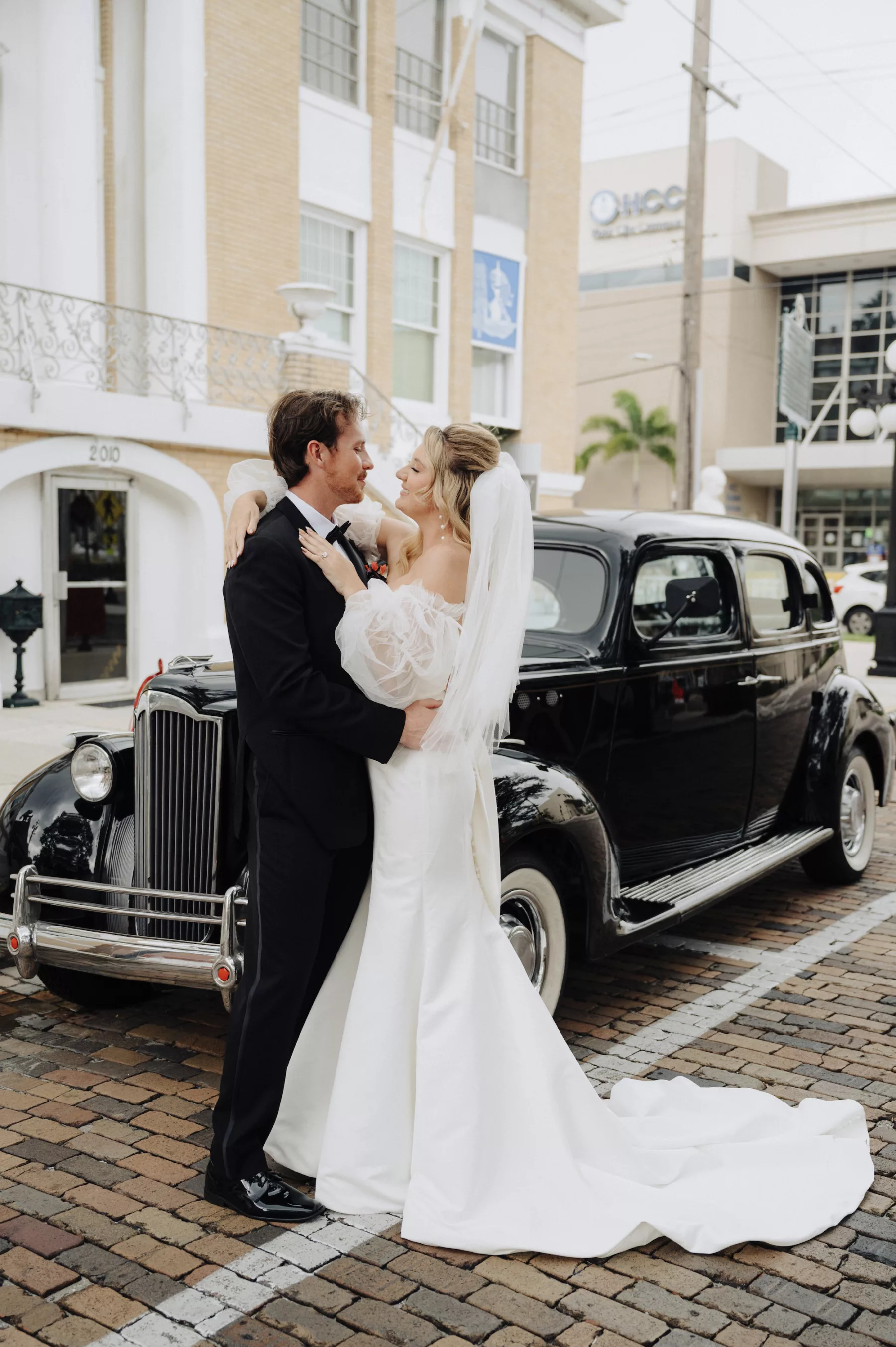 Bride and Groom with Classic Wedding Day Getaway Car Ideas | Tampa Bay Car Rental Classically Ever After | Planner EventFull Weddings | Photographer McNeile Photography