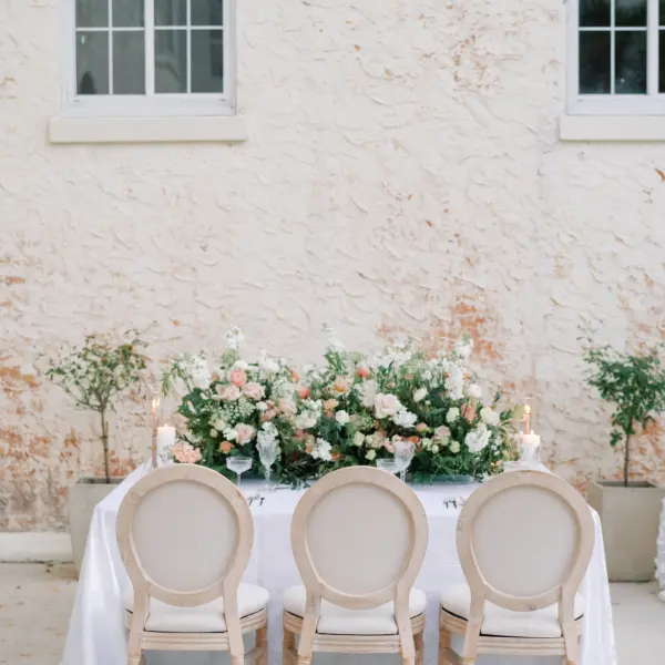 English Garden Inspired Wedding Reception Centerpiece Tablescape Decor Ideas | Pink Roses, White Anemone, Orange Carnations, and Greenery Floral Inspiration | Tampa Bay Over The Top Rental Linens