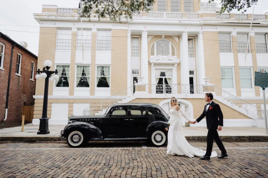 Bride and Groom with Classic Wedding Day Getaway Car Ideas | Tampa Bay Car Rental Classically Ever After | Ybor Content Creator Behind The Vows | Event Venue Cuban Club