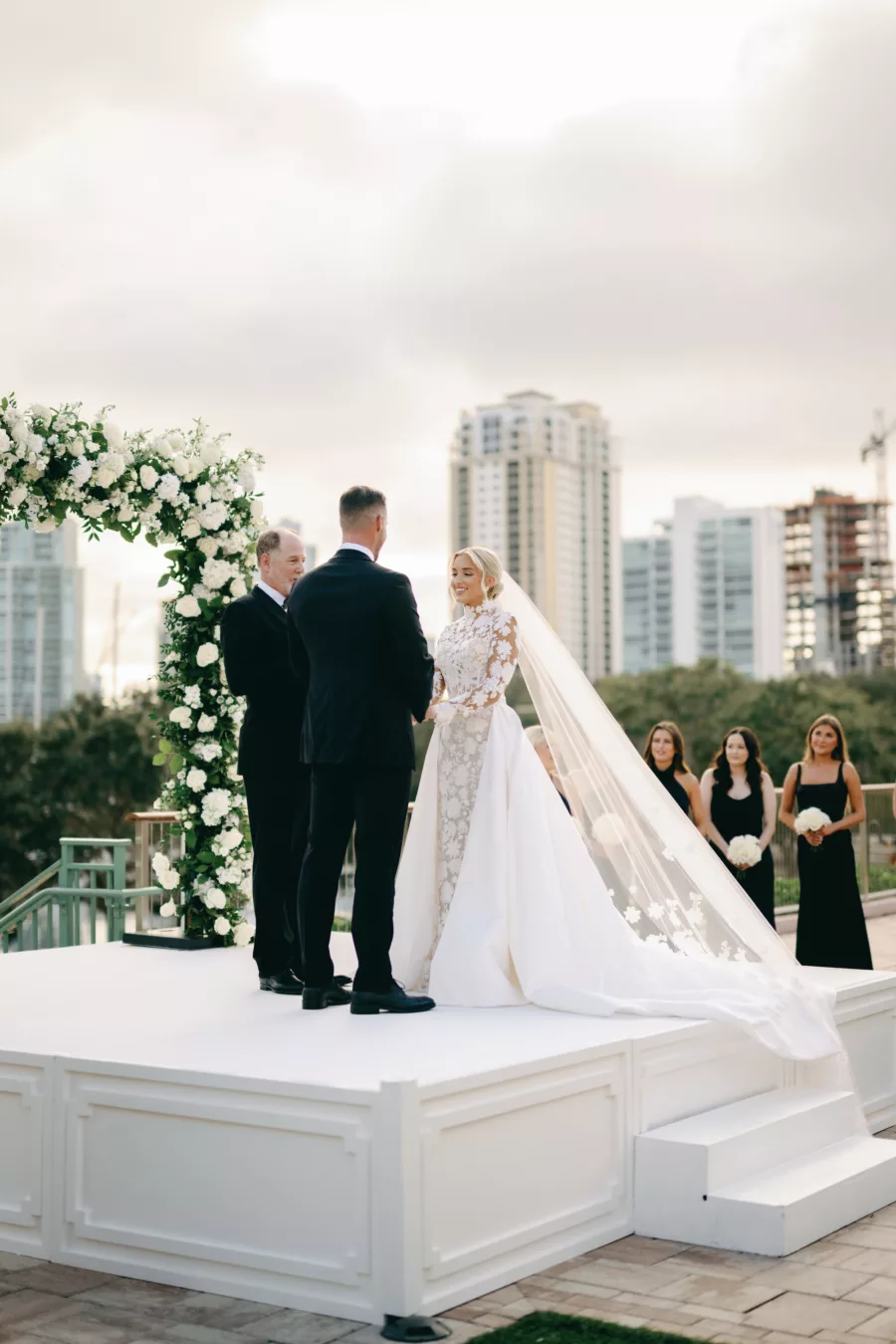 White Roses and Greenery Wedding Ceremony Altar Arch and Stage Decor Ideas | St Pete Historic Hotel Venue The Vinoy