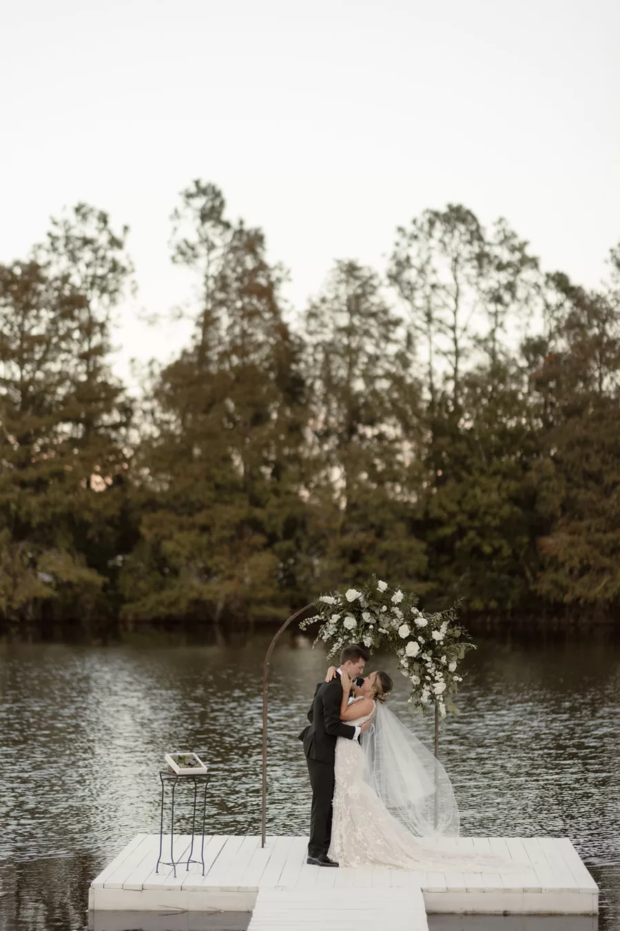 Bride and Groom First Kiss Wedding Portrait | Central Florida Photographer and Videographer Evoke Photo and Film