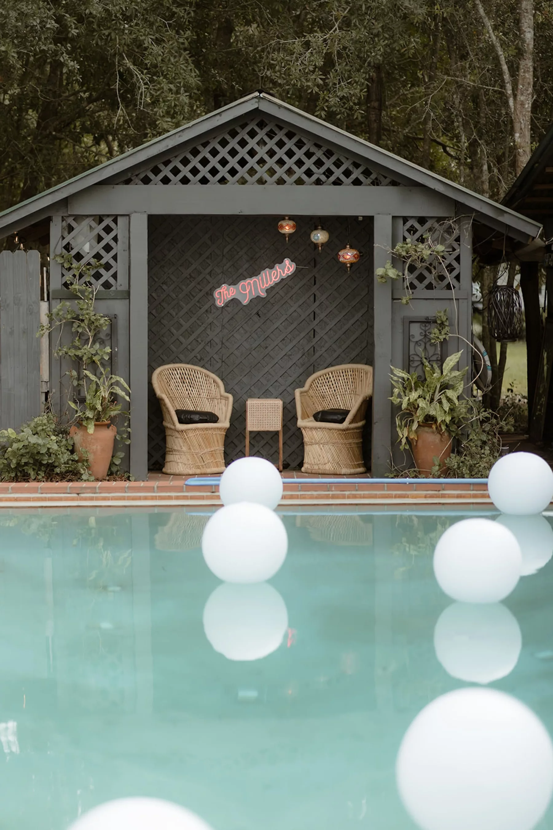 Wedding Welcome Pool Party Decor Ideas | Floating Balloons, Pink Neon Sign Inspiration