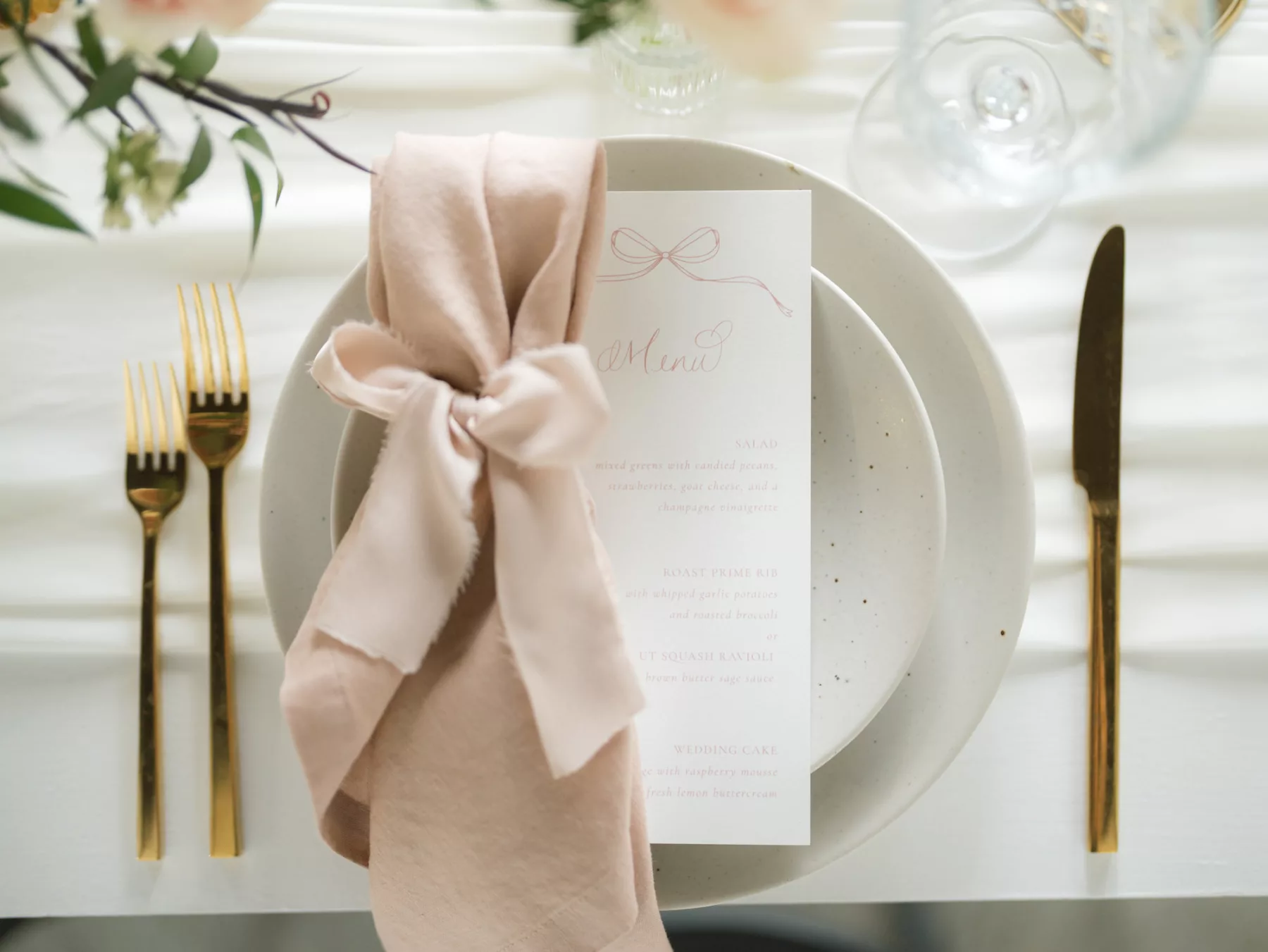 Feminine Blush Pink Wedding Reception Place Setting Inspiration | Gold Flatware, Speckled Dinner Plates, and Pink Menu Card Ideas