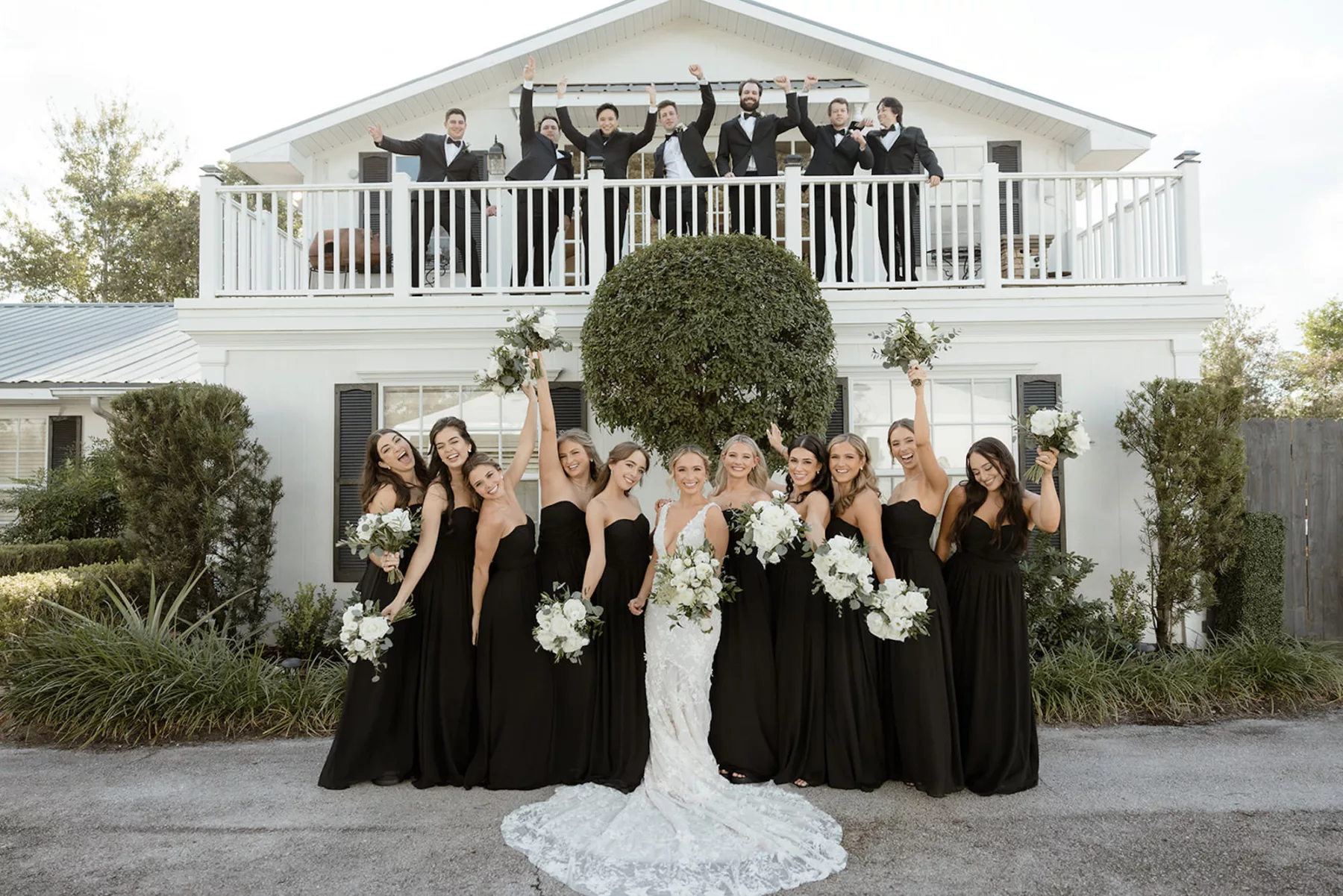 Matching Black Bridesmaid Dresses and Groomsmen Suits Wedding Party Attire Ideas | Central Florida Hair and Makeup Artist Femme Akoi Beauty Studio | Photographer and Videographer Evoke Photo and Film