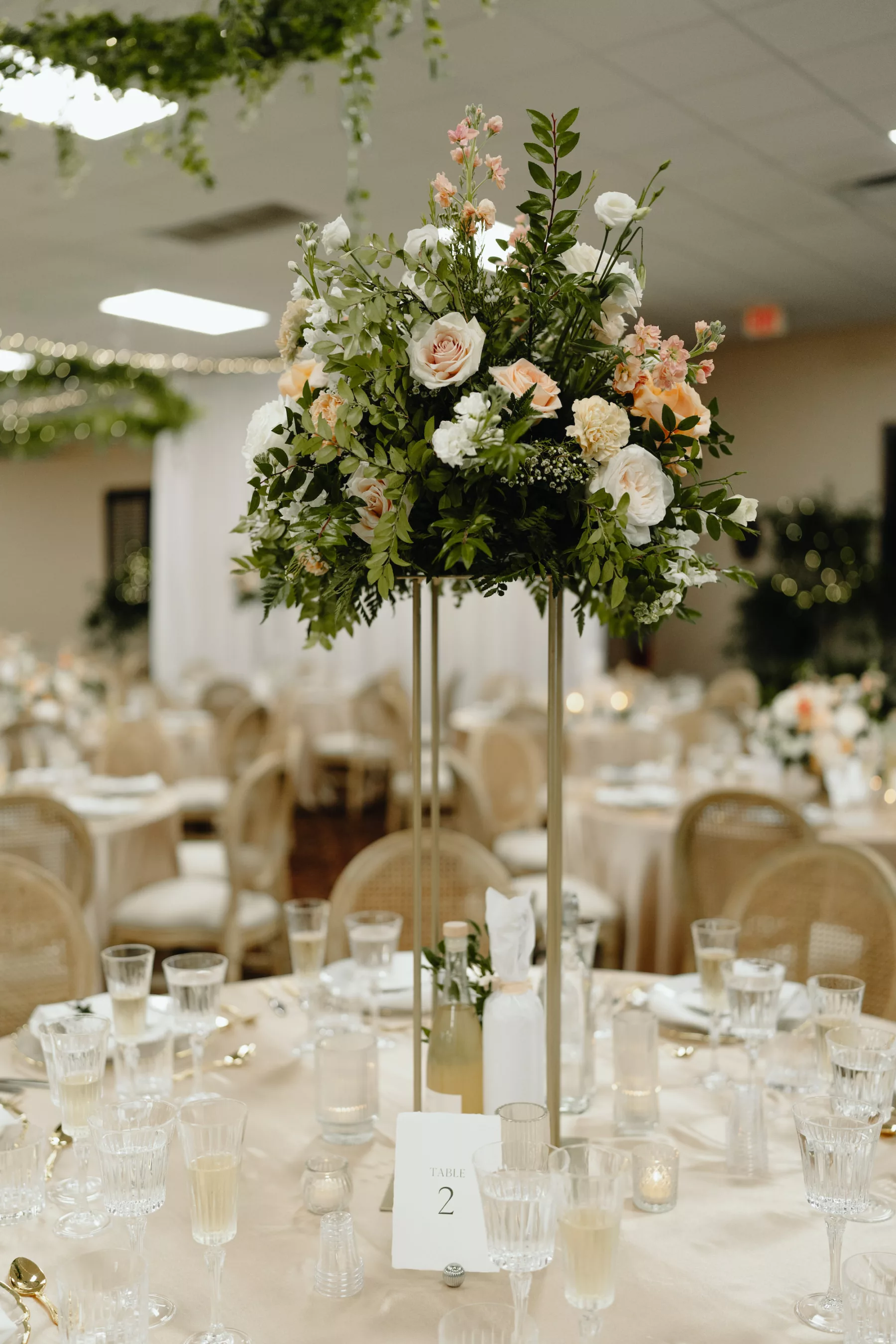 Tall Italian Inspired Gold Flower Stand with Pink and White Roses, and Greenery | Classic Neutral Wedding Ideas