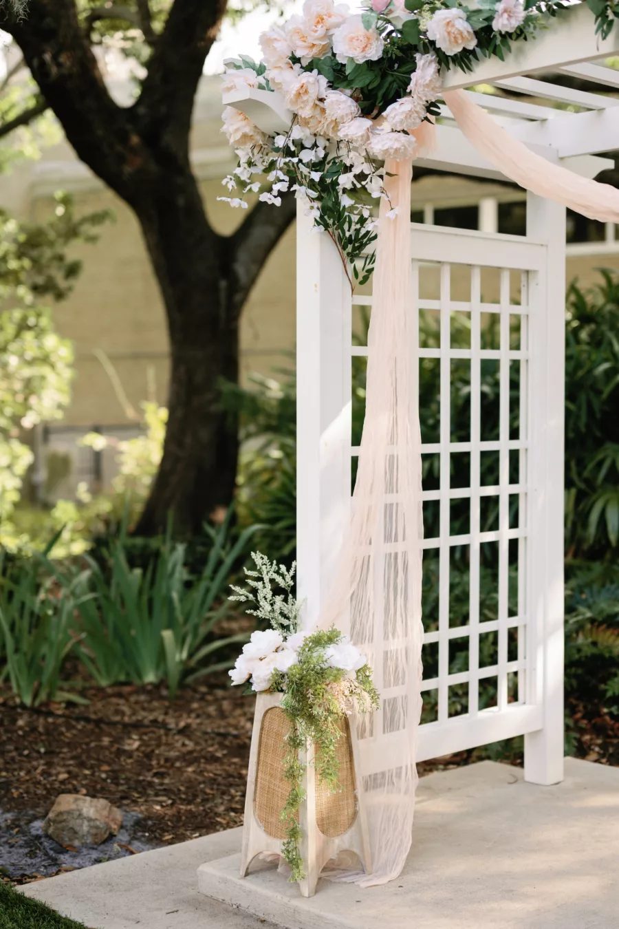 Romantic Neutral Wedding Ceremony Pergola Altar Decor Inspiration with Dainty Drapery, White and Pink Garden Roses