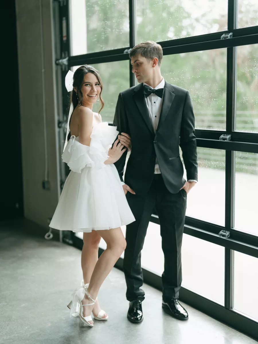 Off The Shoulder Ruffle Mini Wedding Dress Inspiration | Black Tuxedo Groom's Attire Ideas