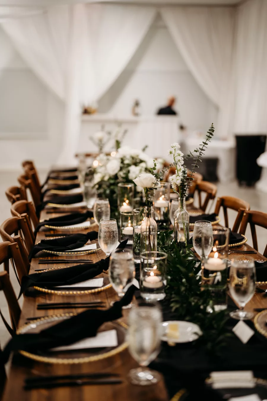 Elegant Rustic Black Wedding Reception Tablescape Ideas | Wooden Feasting Tables, Crossback Chairs | Tampa Bay Event Caterer Events Done Right