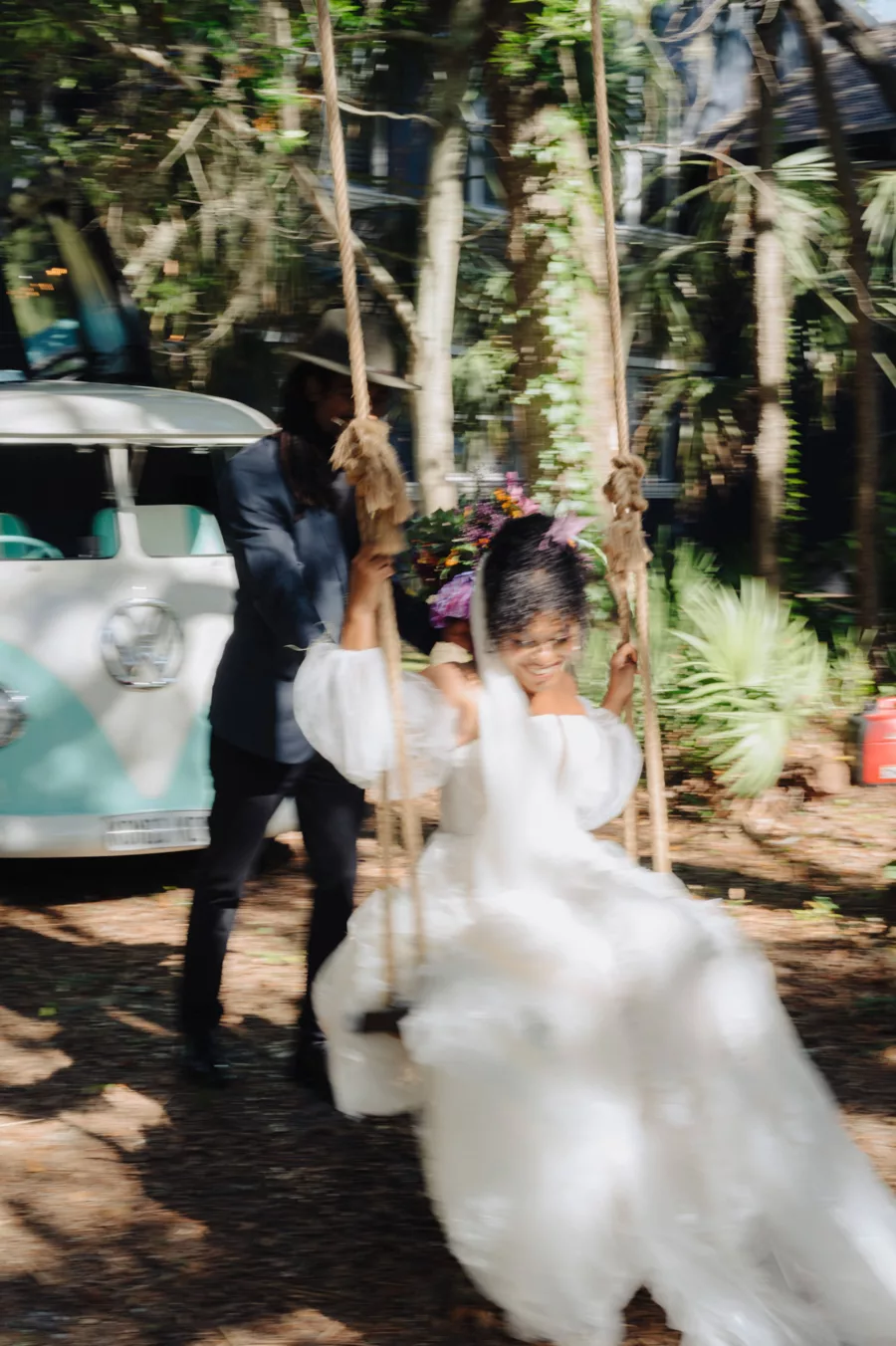 Groom Pushing Bride on Swing | Tampa Bay Photographer McNeile Photography