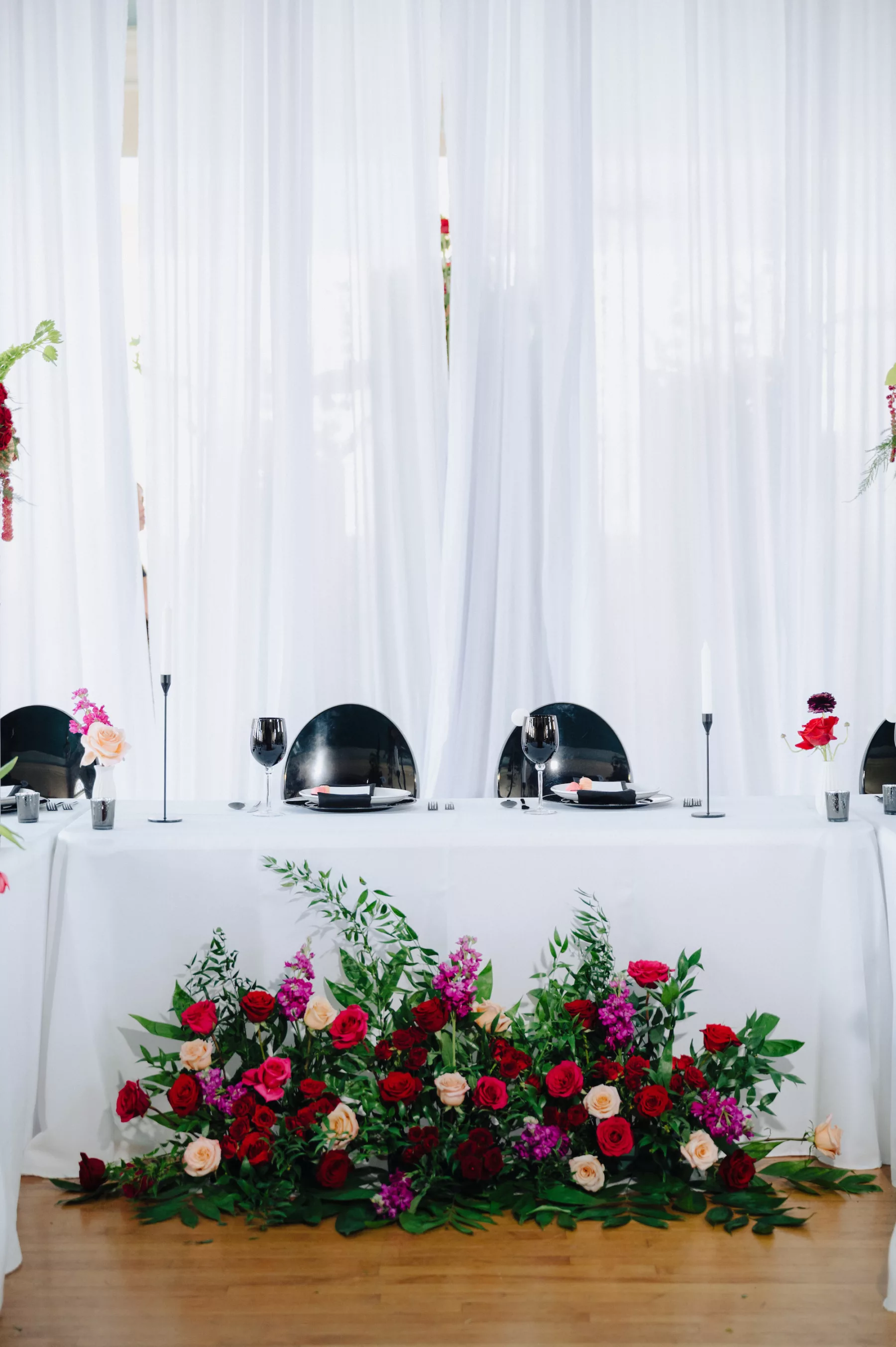Modern Black and Pink Italian Inspired Wedding Reception | U-Shaped Table Setting | Greenery, Pink and Red Rose Flower Arrangement Decor Ideas | Tampa Bay Florist Save The Date Florida