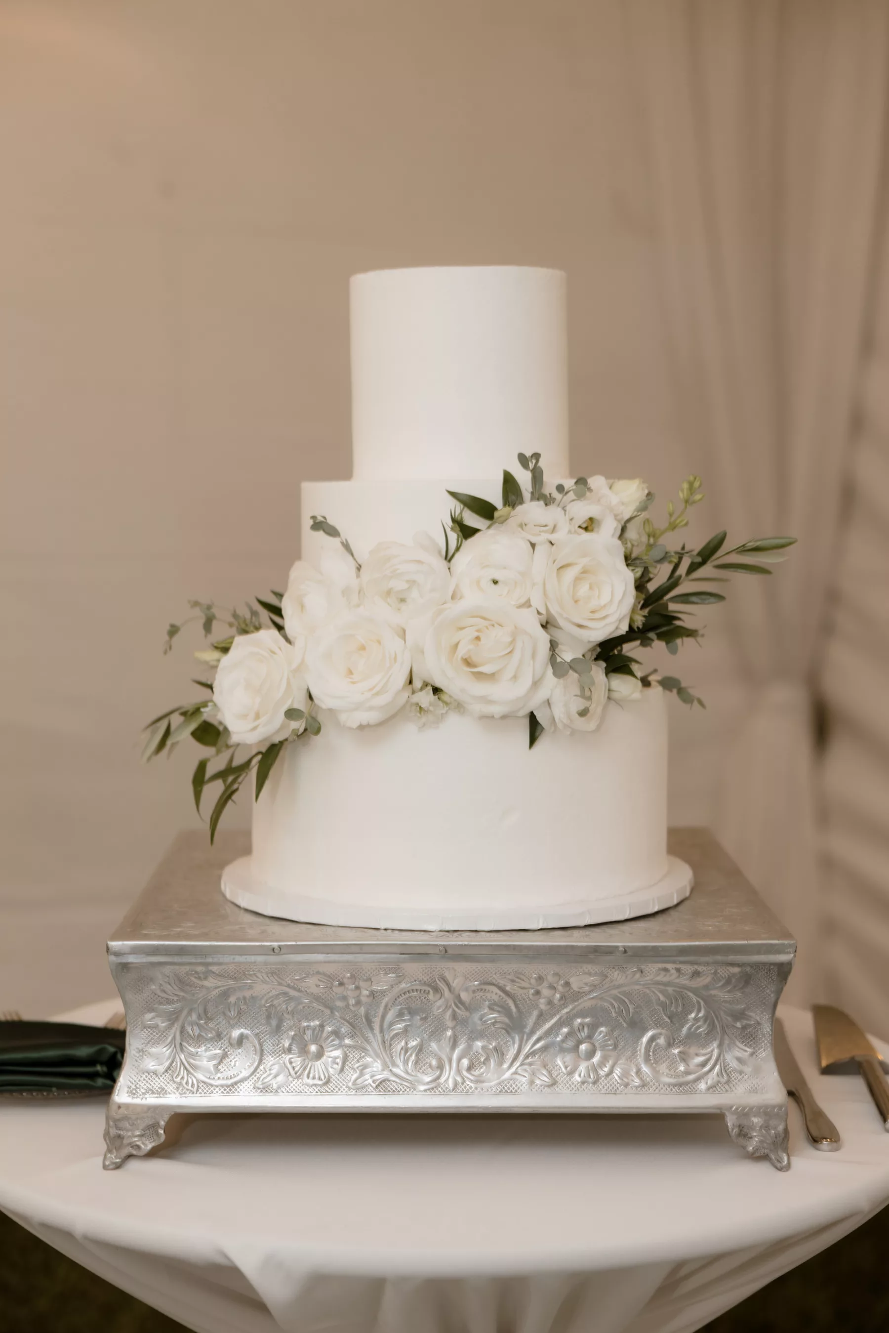 Classic Round Three-Tiered White Wedding Cake with Roses and Greenery Ideas