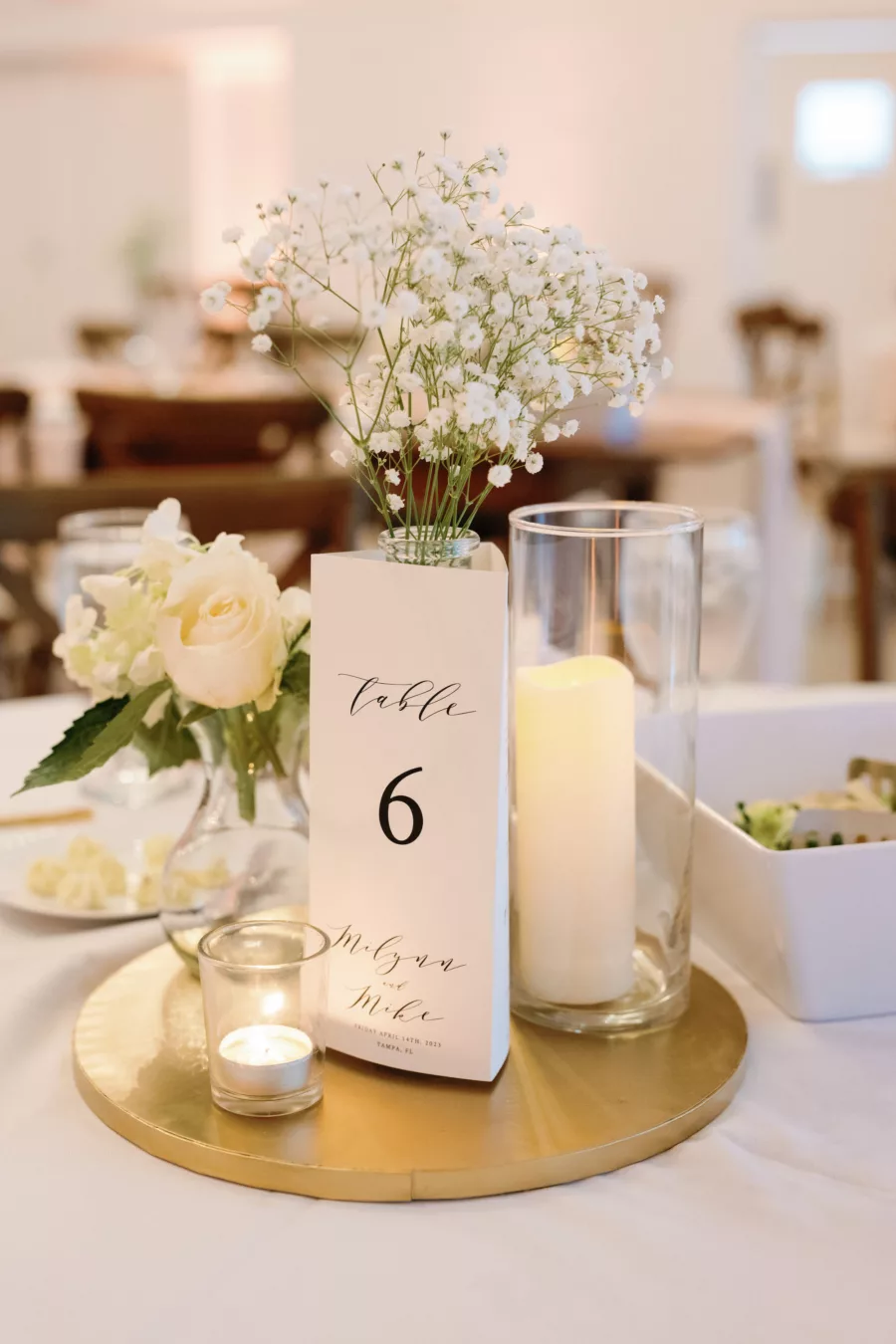 Vintage Wedding Reception Centerpiece Decor Inspiration | White Baby's Breath, Roses, and Candles