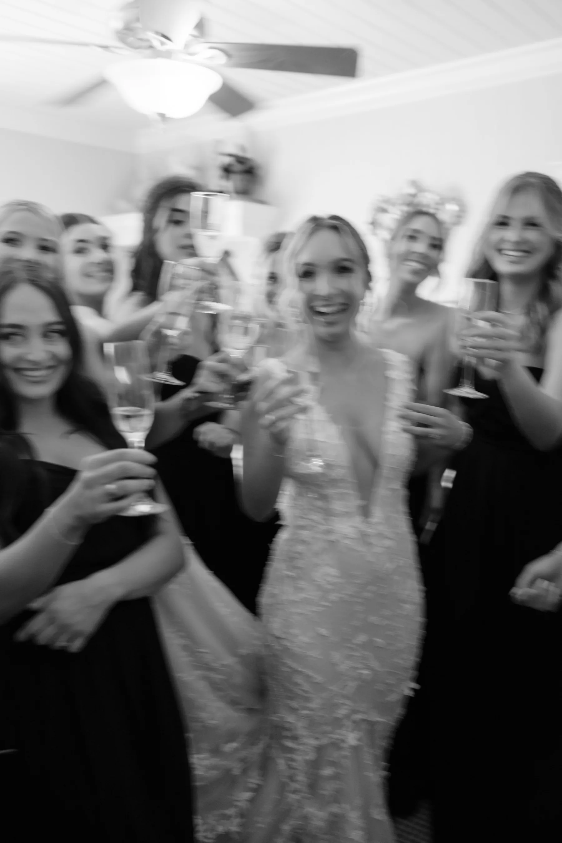 Bride and Bridesmaids Champagne Celebration Wedding Portrait | Central Florida Photographer and Videographer Evoke Photo and Film