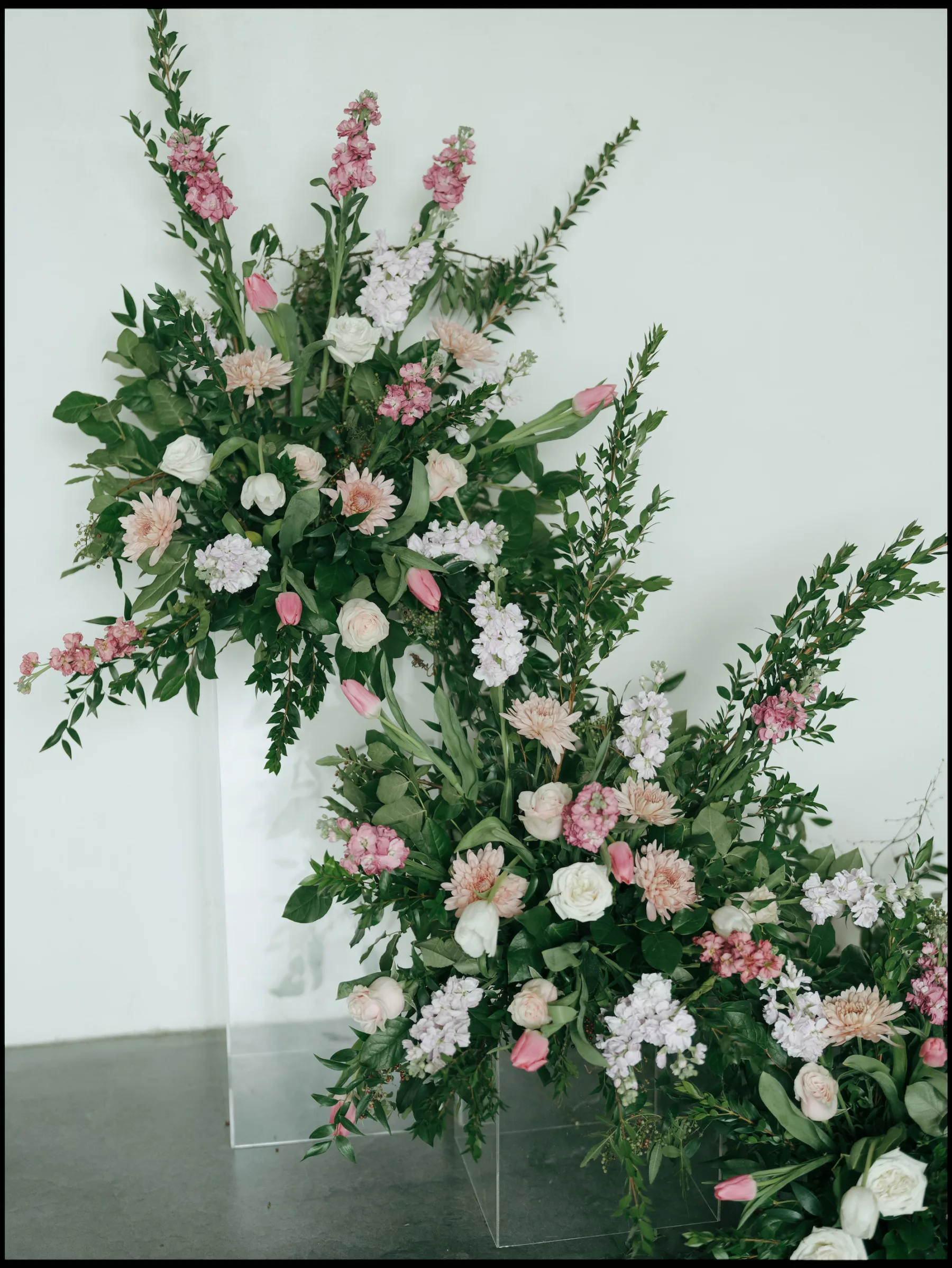 Whimsical Pink and White Roses, Chrysanthemums, Tulips, and Greenery Floral Arrangement Wedding Ceremony Backdrop Inspiration | Tampa Bay Florist Save The Date Florida