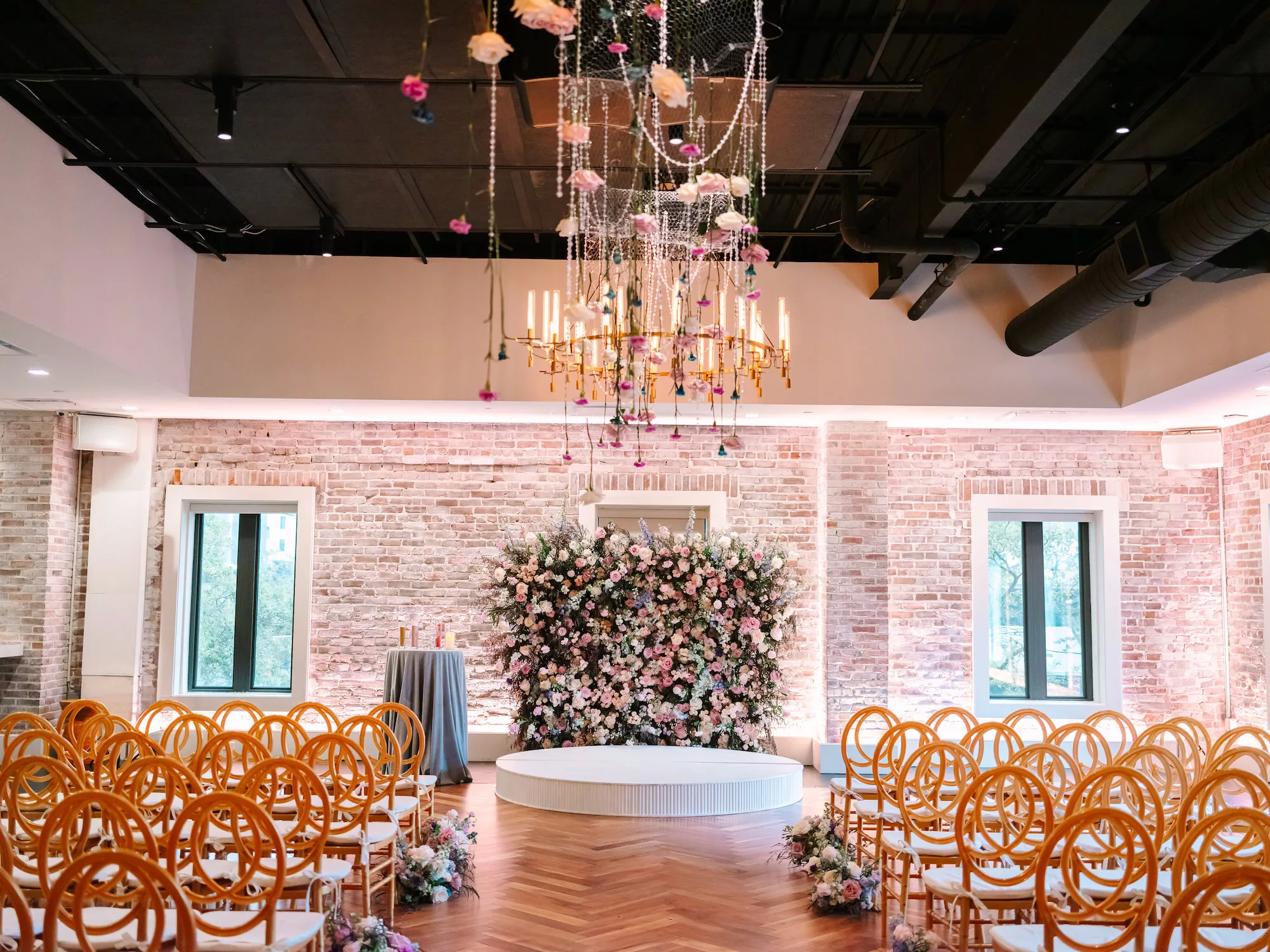 Whimcial Pink and Blue Wedding Ceremony Ideas | Pink Roses, White Hydrangeas, Blue Stock Flowers, and Greenery Backdrop Inspiration | St Pete Venue Red Mesa Events | Planner Wilder Mind Events