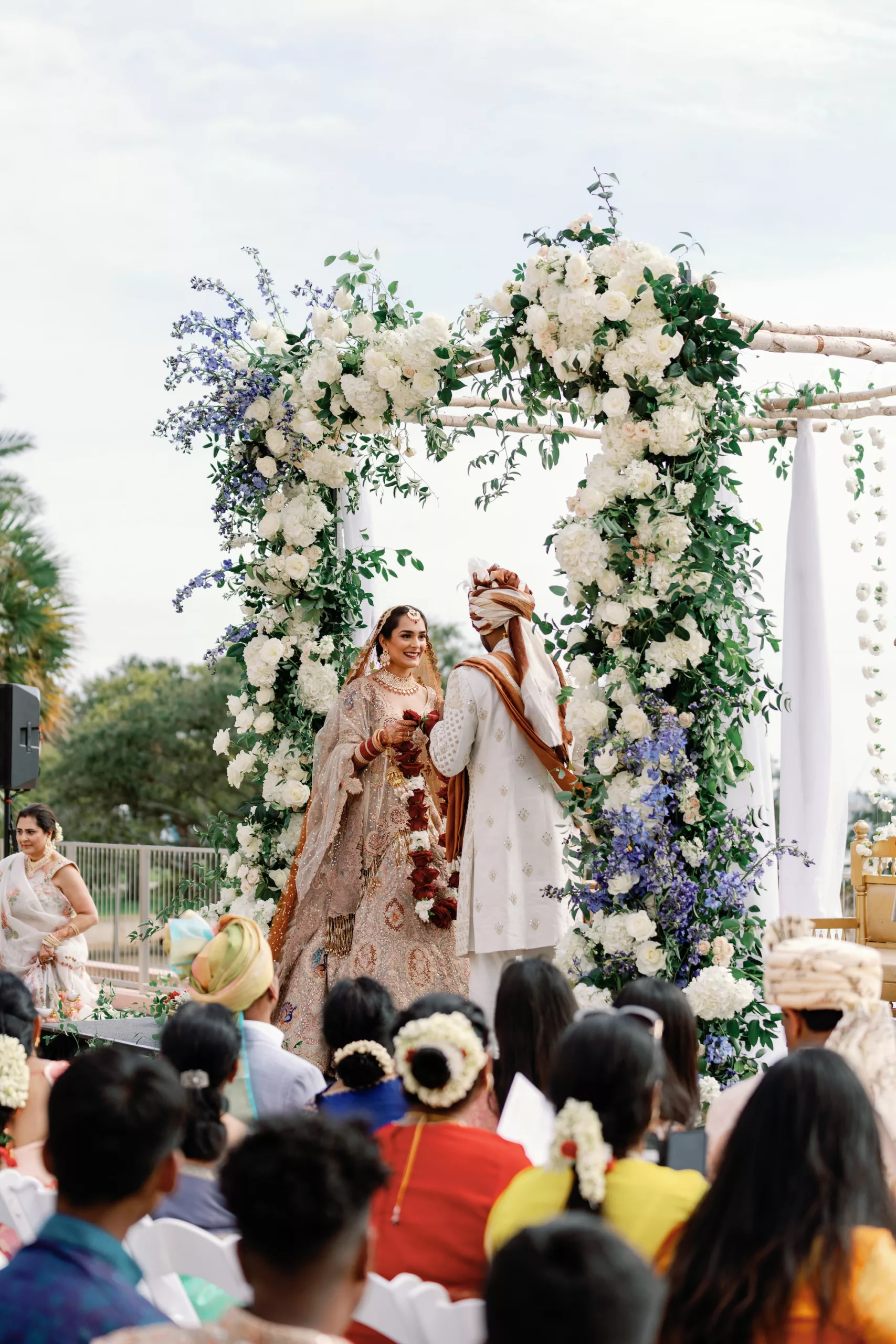 Bride and Groom Hindu Indian Wedding Ceremony Decor Ideas | Elegant Floral Arch with White Roses, Hydrangeas, and Greenery Flower Arrangement Inspiration
