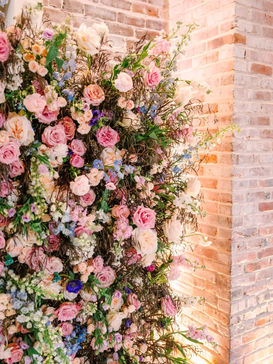 Whimcial Pink and Blue Wedding Ceremony Backdrop Decor Ideas | Pink Roses, White Hydrangeas, Blue Stock Flowers, and Greenery Backdrop Inspiration