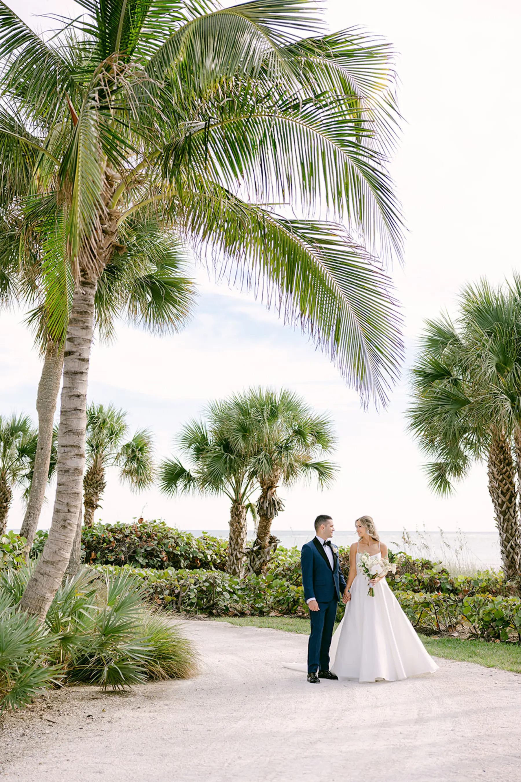Bride and Groom First Look Wedding Portrait | Sarasota Waterfront Beach Venue The Resort at Longboat Key Club | Planner Elegant Affairs by Design