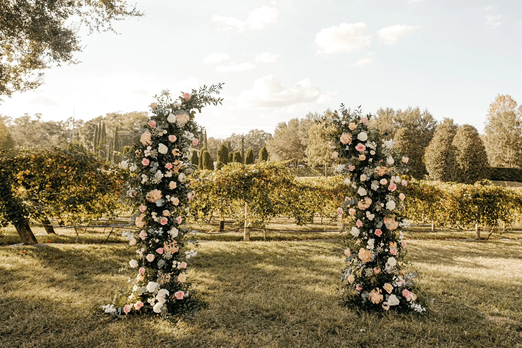 White and Pink Roses, Hydrangeas, and Greenery Wedding Ceremony Altar Decor Ideas | Tampa Bay Event Florist Monarch Events