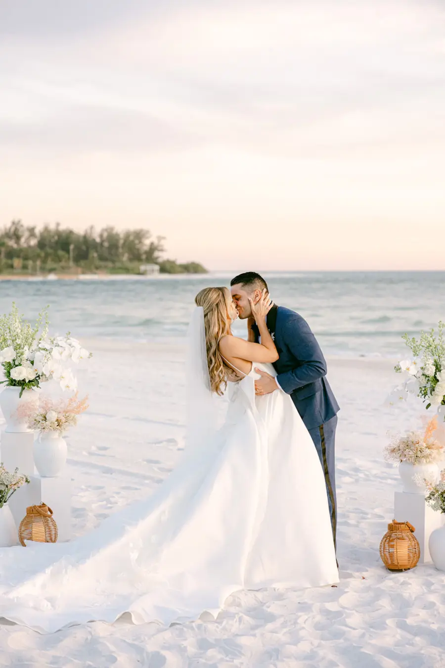 Bride and Groom First Kiss Wedding Portrait | Sarasota Waterfront Beach Venue The Resort at Longboat Key Club | Planner Elegant Affairs by Design