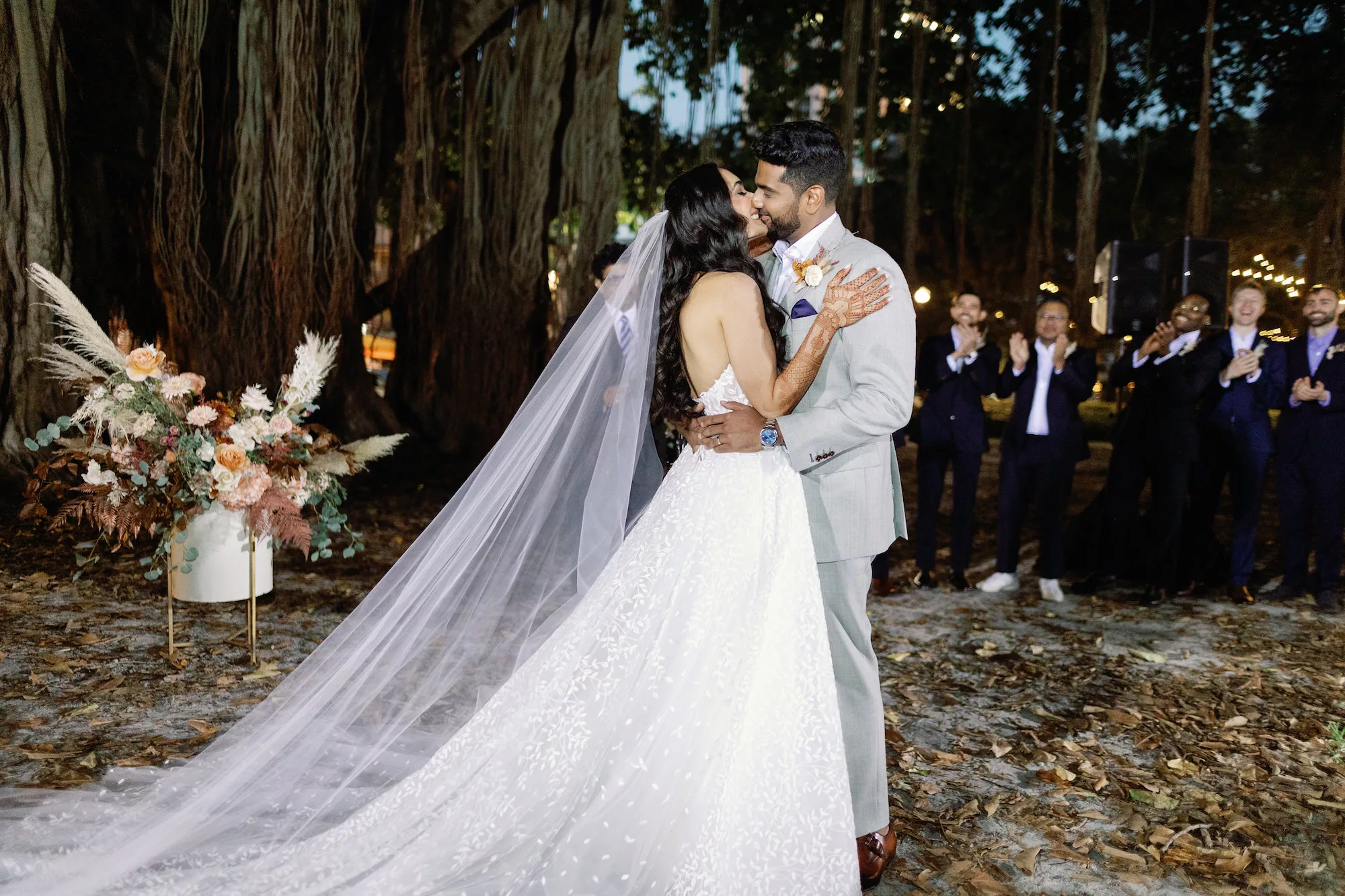 Outdoor Boho Wedding Ceremony Ideas | Bride and Groom First Kiss Wedding Portrait | St Pete N. Staub Park