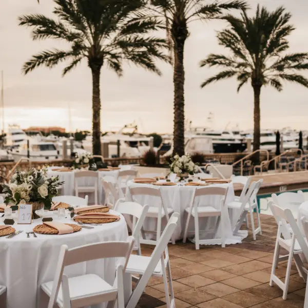Timeless Outdoor Poolside Wedding Reception Tablescape Place Setting Ideas | Hyacinth Placemat with Neutral Linen Inspiration | Tampa Bay Event Venue Westshore Yacht Club