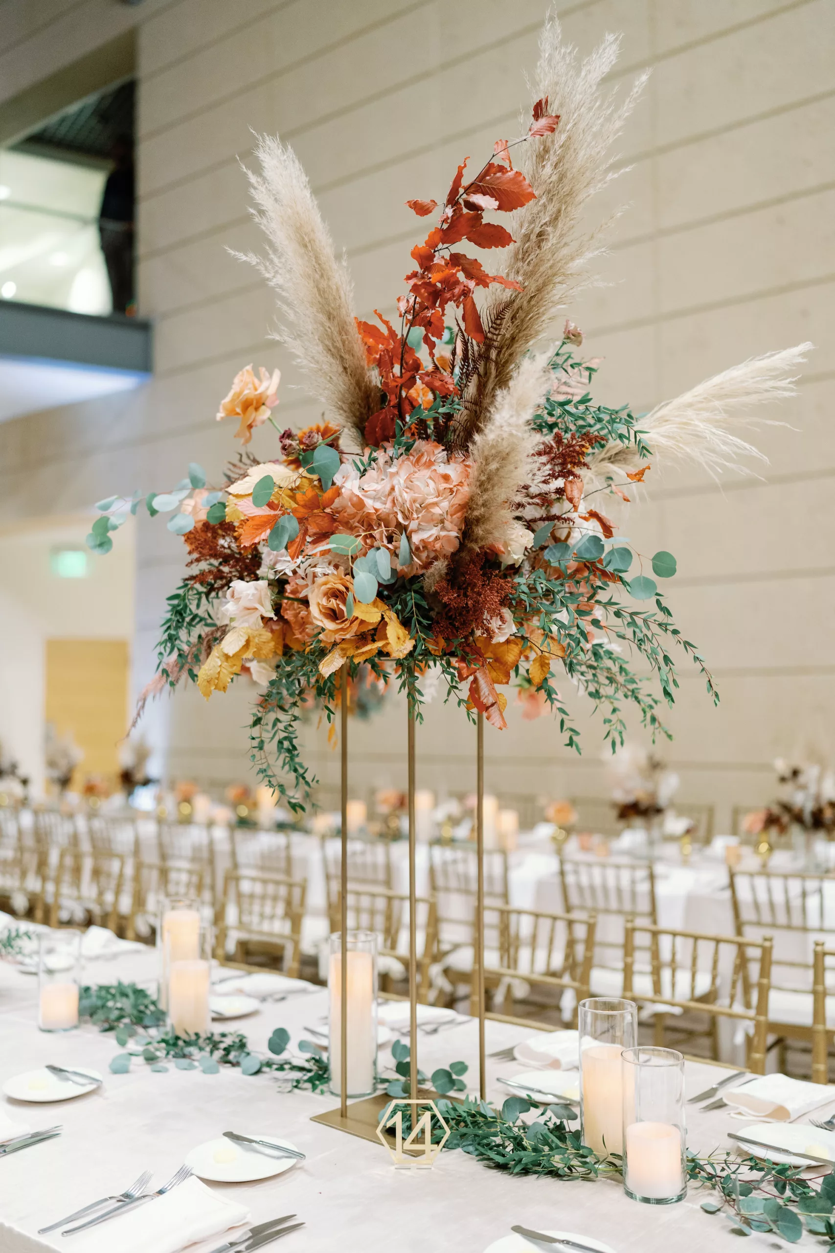 Luxurious Cream and White Wedding Reception Centerpiece Decor Ideas | Greenery Garland, Dried Pampas Grass, Ferns, Greenery, Brown Leaves, and Tall Gold Flower Stand