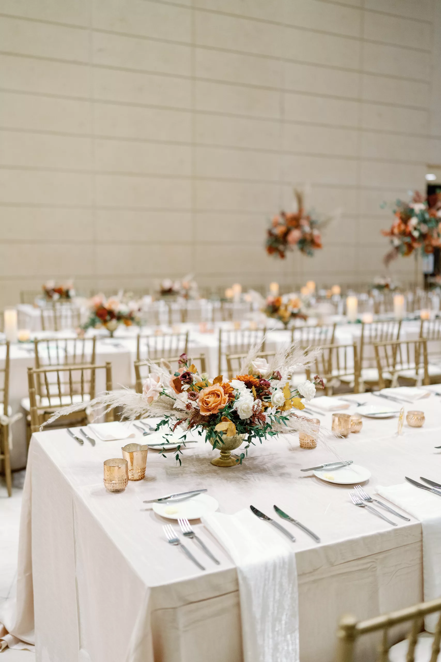 Luxurious Cream and Burnt Orange Boho Indian Wedding Reception Tablescape Decor Ideas | Long Feasting Tables | Dried Pampas Grass, Ferns, Brown Leaves and Gold Geometric Vase | Tampa Bay Event Planner Coastal Coordinating | St Pete Venue Museum of Fine Arts | Caterer Olympia Catering