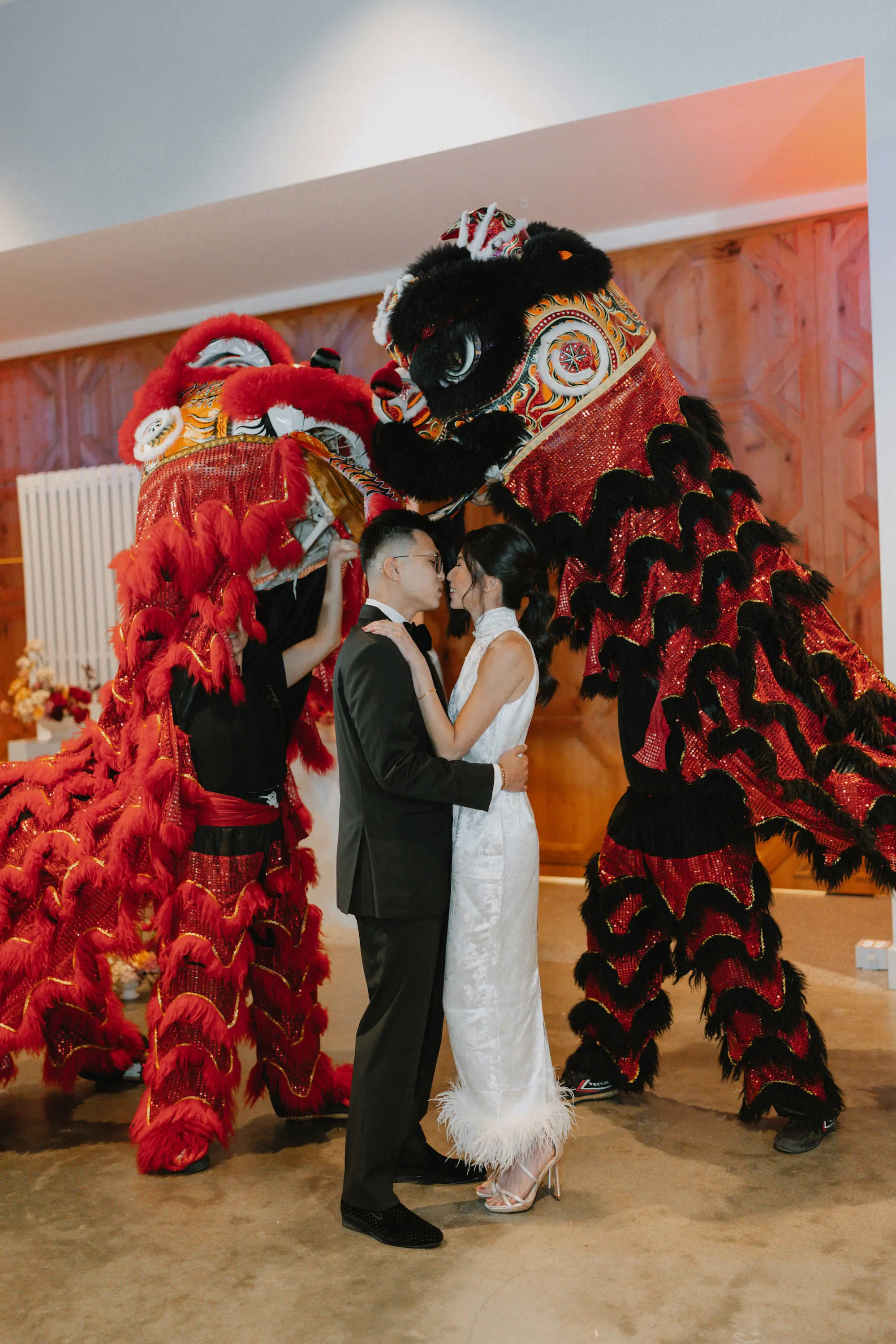 Chinese Wedding Reception Lion Dance Tradition Inspiration | White Satin and Feather Qipao Reception Dress Ideas