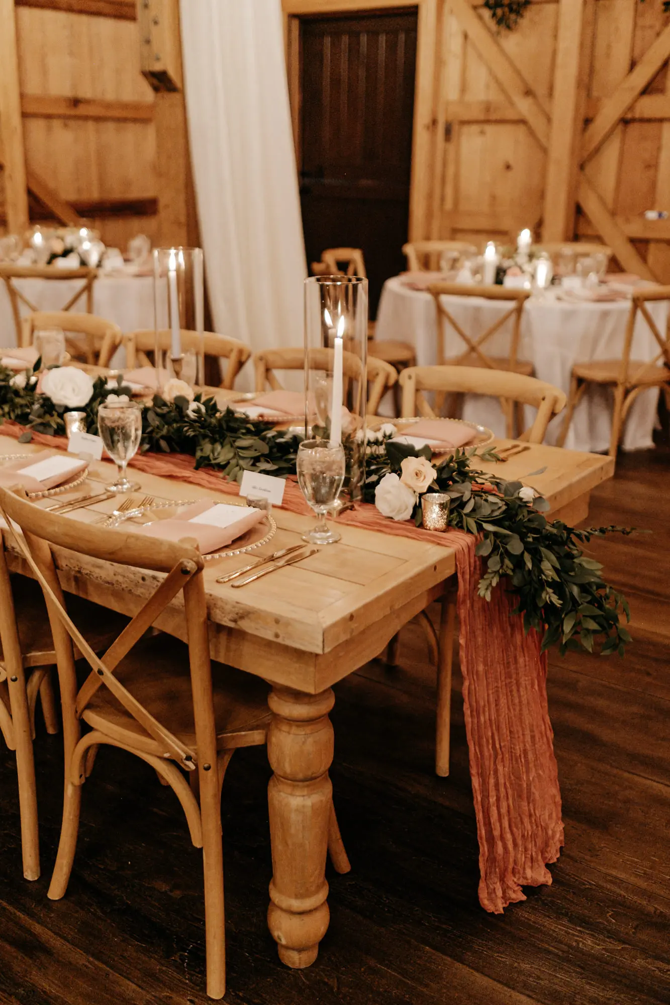 Rustic Garden Pink and Gold Barn Wedding Reception Tablescape Place Setting Long Feasting Table Decor Ideas | Greenery Garland with White Taper Candles Centerpiece Inspiration | Tampa Bay Florist Monarch Events