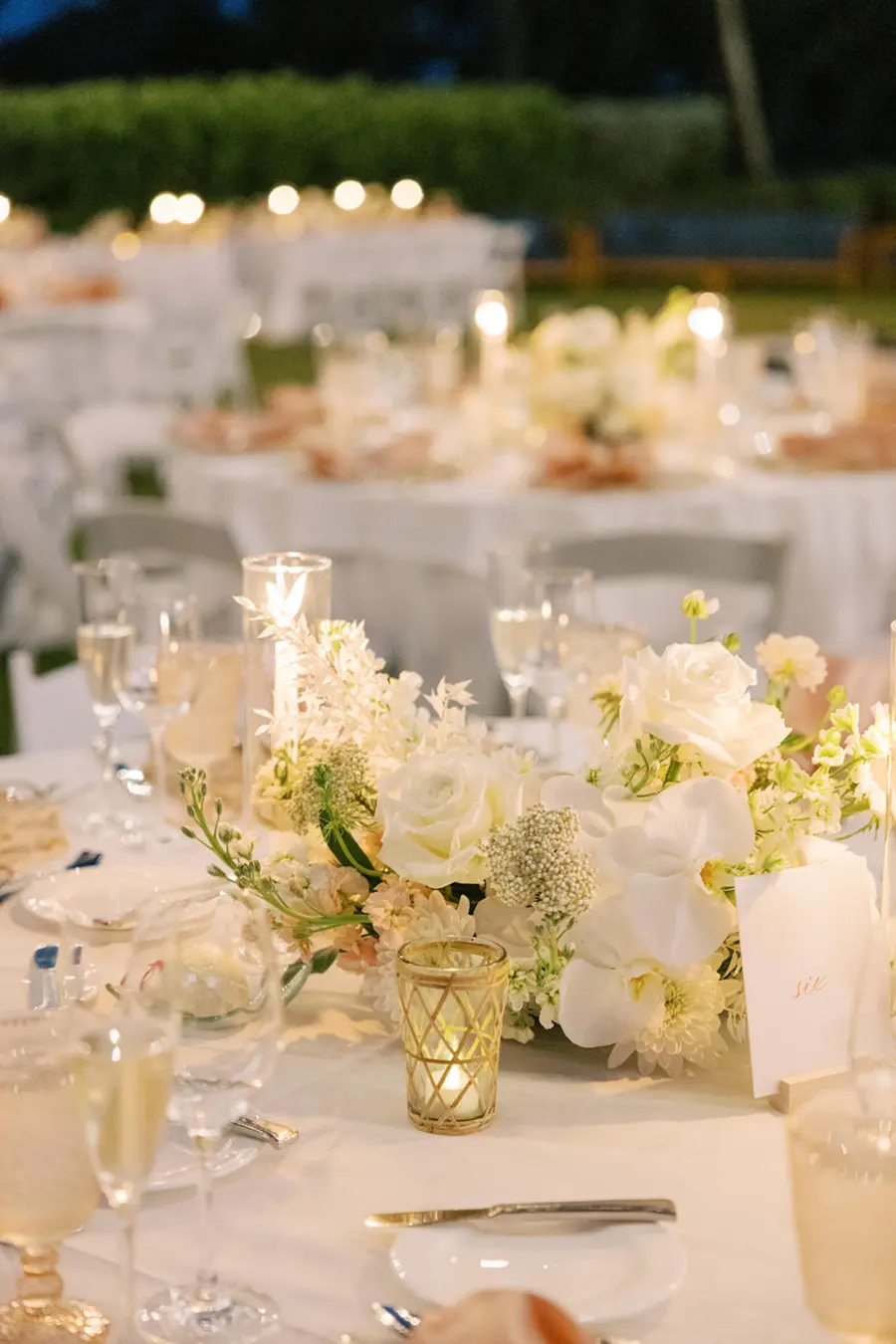 Elegant Monochromatic Wedding Reception Tabletop Centerpiece Ideas | White Roses and Orchids Flower Arrangement Inspiration