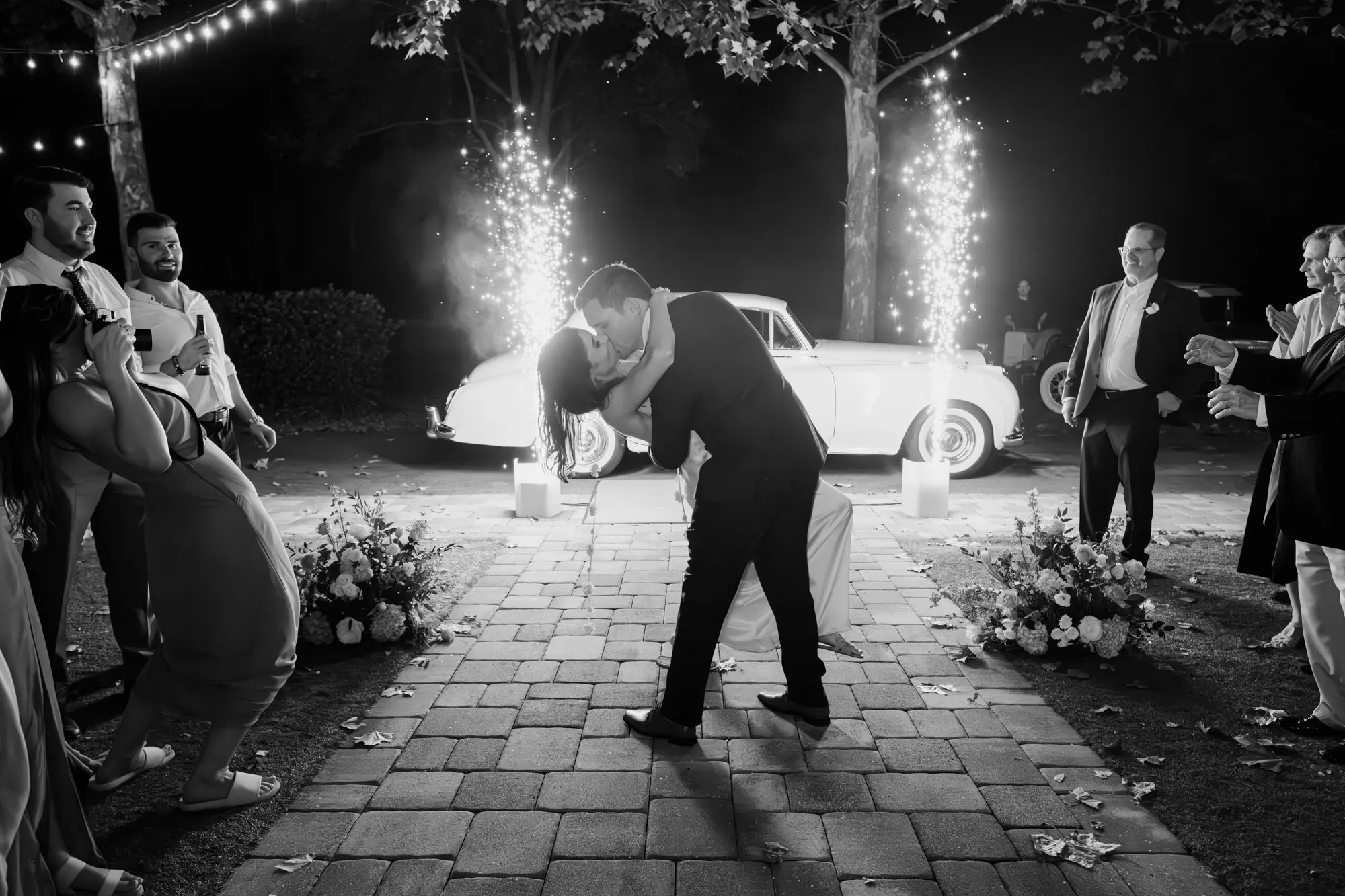Bride and Groom Cold Spark Wedding Reception Grand Exit with Classic White Getaway Car Ideas | Tampa Bay Event Planner Coastal Coordinating