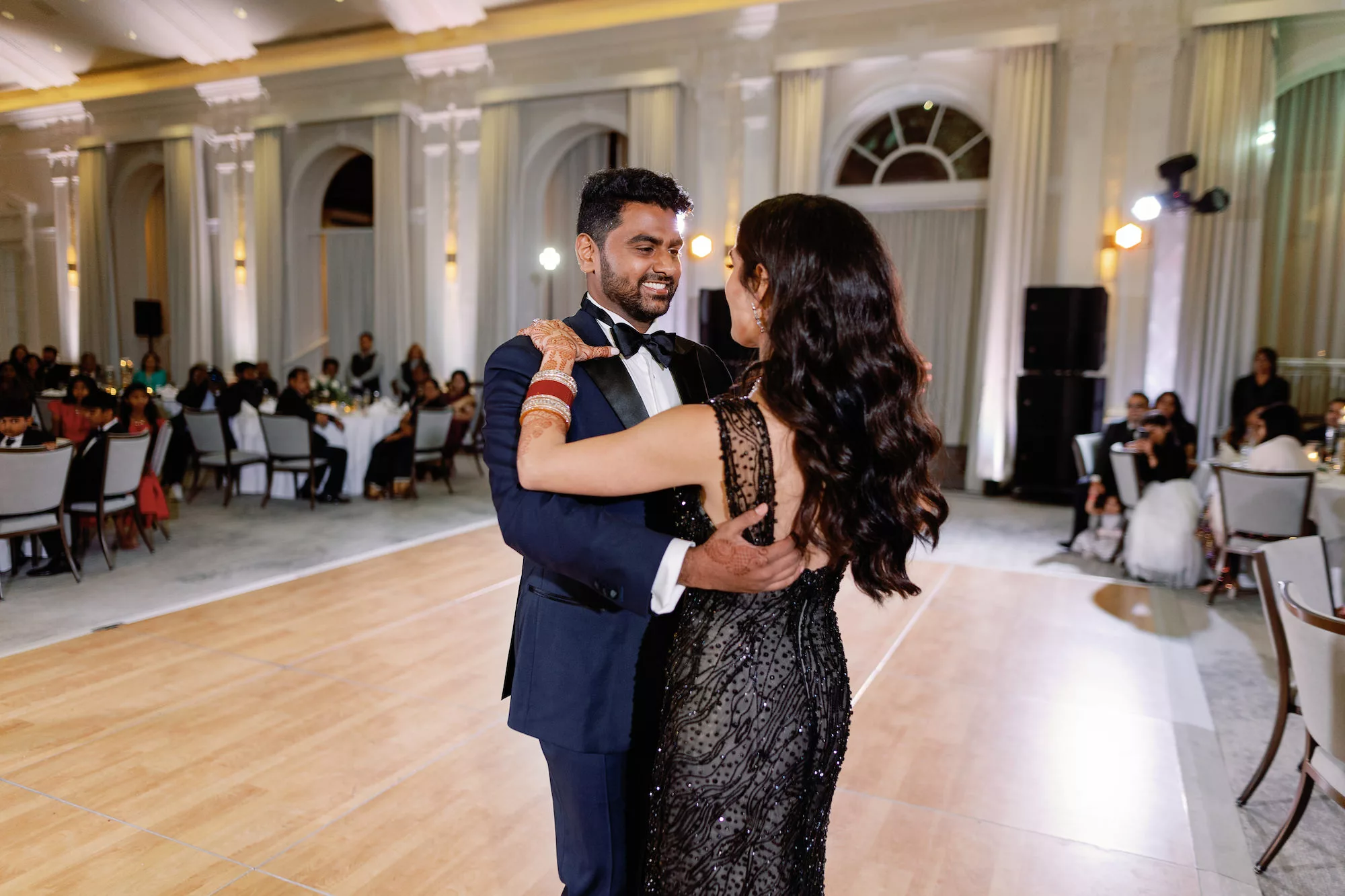 Bride and Groom First Dance Grand Ballroom Wedding Portrait | Black Beaded Bridal Reception Dress Inspiration