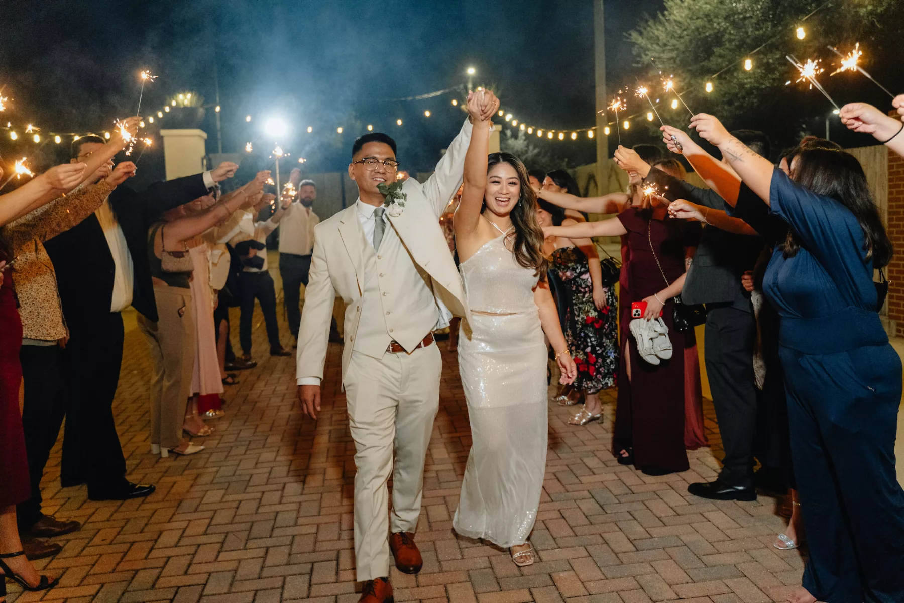 Bride and Groom Wedding Reception Sparkler Grand Exit Ideas | White Bridal Reception Two Piece Outfit Inspiration
