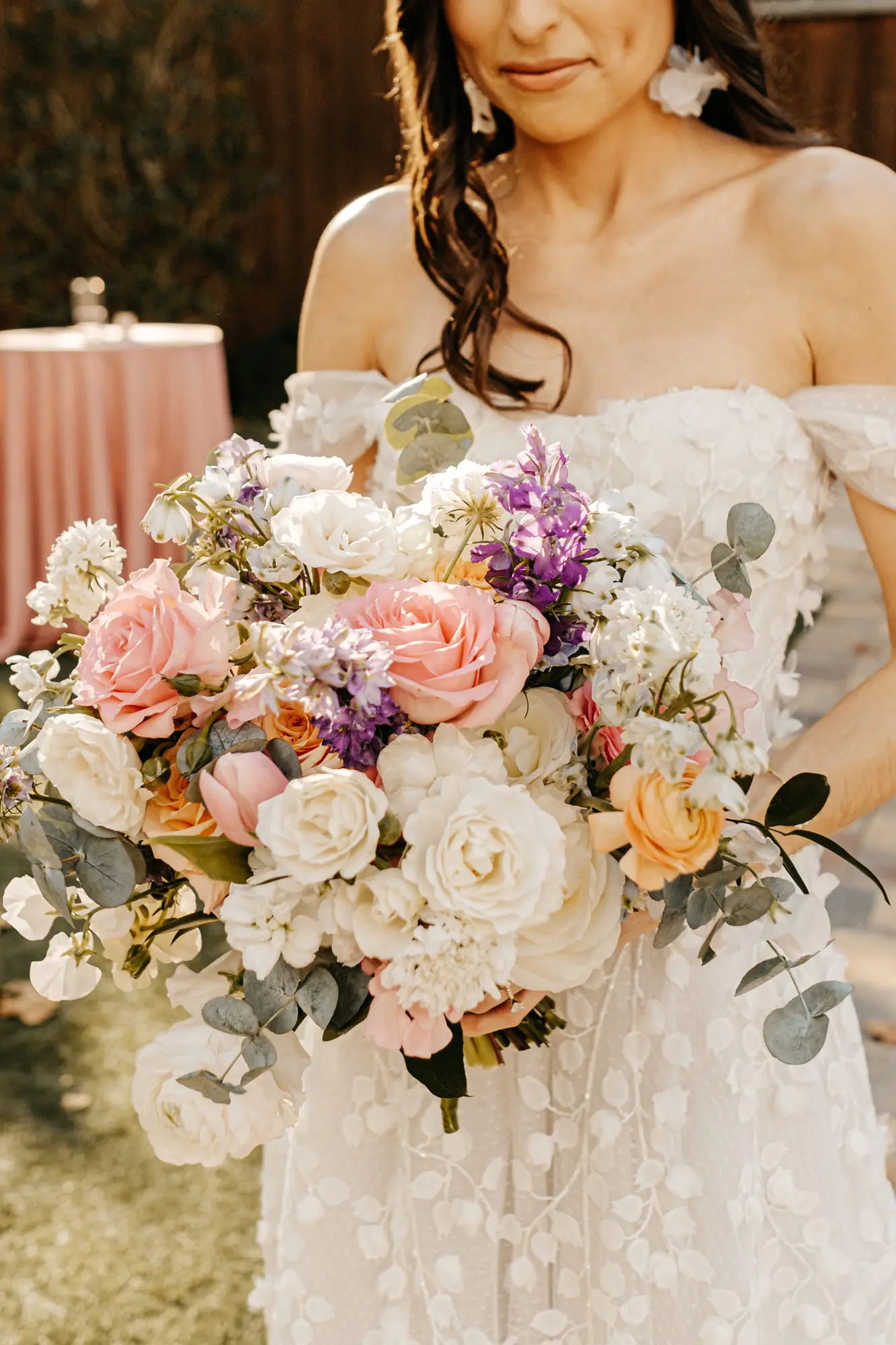 Spring Bridal Wedding Bouquet Ideas | Pink and Orange Roses, White Hydrangeas, Purple Flowers, and Greenery Floral Arrangement Inspiration | Tampa Bay Florist Monarch Events