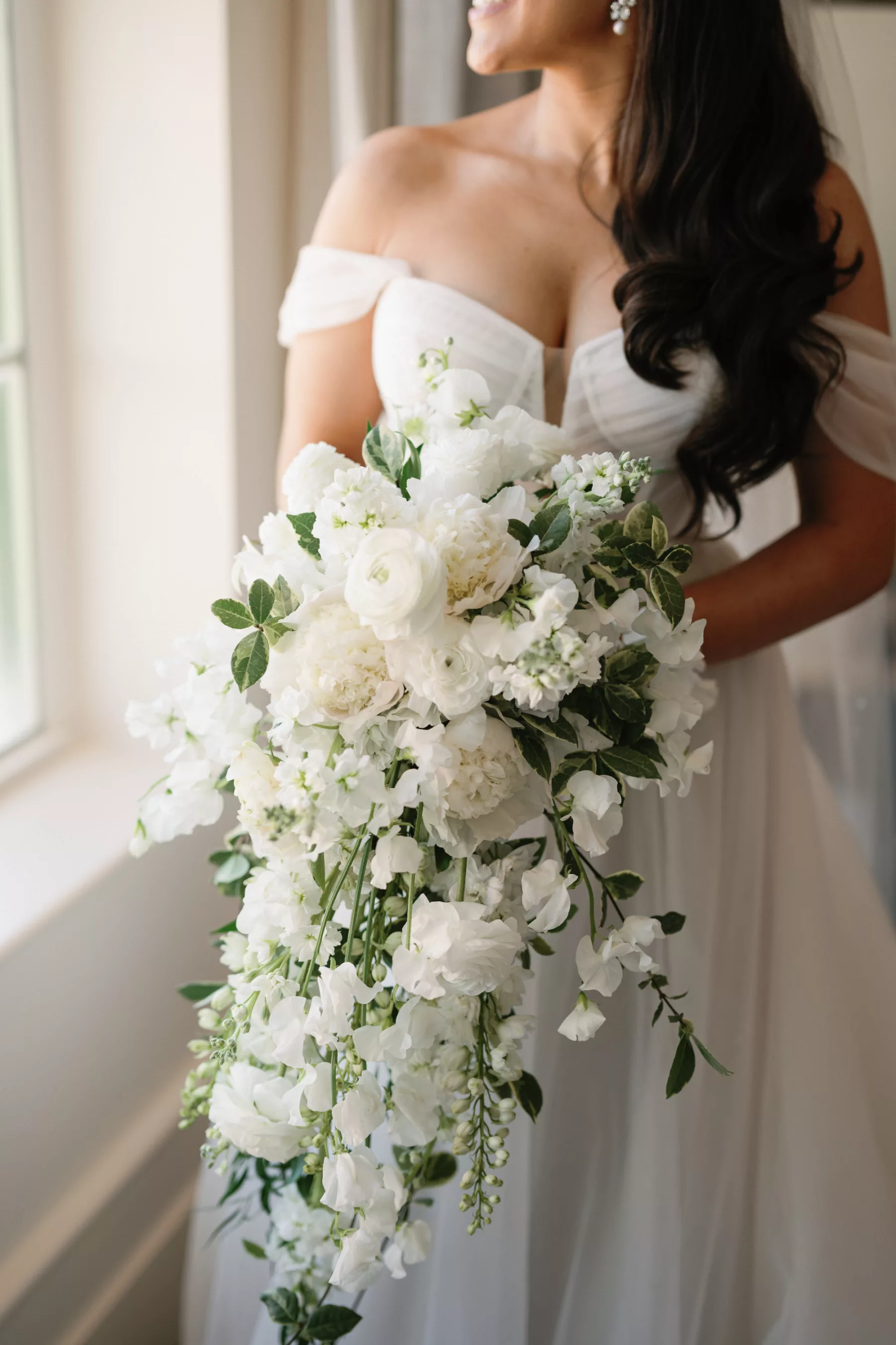 Monochromatic Cascading Bridal Bouquet with White Roses and Hydrangeas | St Pete Florist Botanica Design Studio