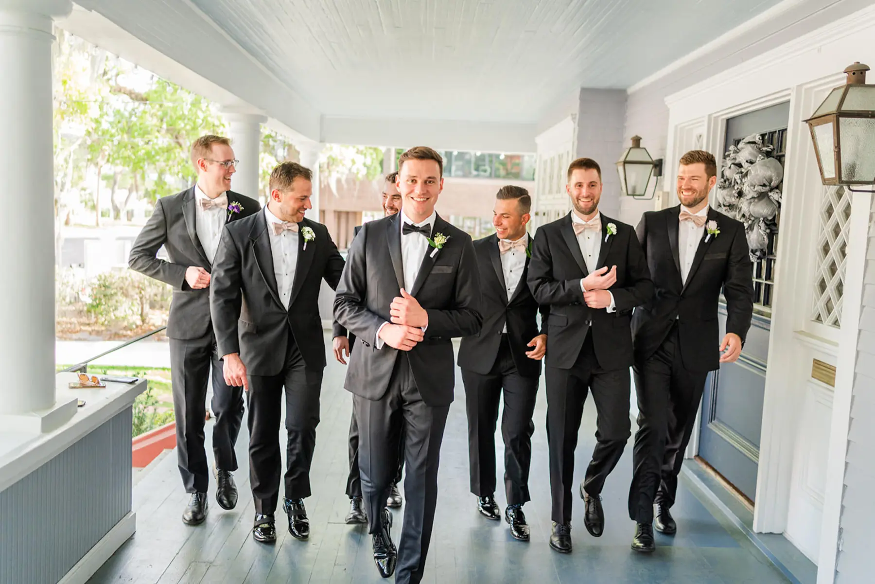 Groom and Groomsmen in Black Tuxedos Wedding Ideas