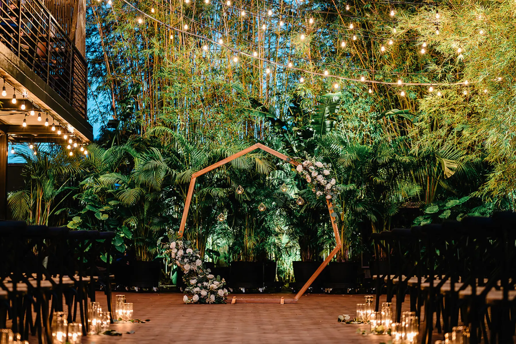 Great Gatsby Inspired Black and Gold Modern New Years Eve Bamboo Garden Wedding Ceremony Decor Ideas | Rustic Wooden Heptagon Arch Inspiration | St Pete Event Venue Nova 535