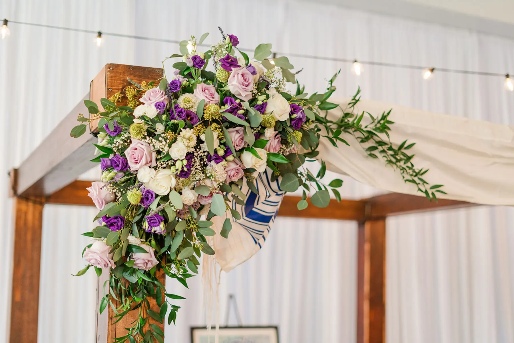 Elegant Wooden Wedding Jewish Ceremony Chuppah Arch with Purple Spring Floral Inspiration